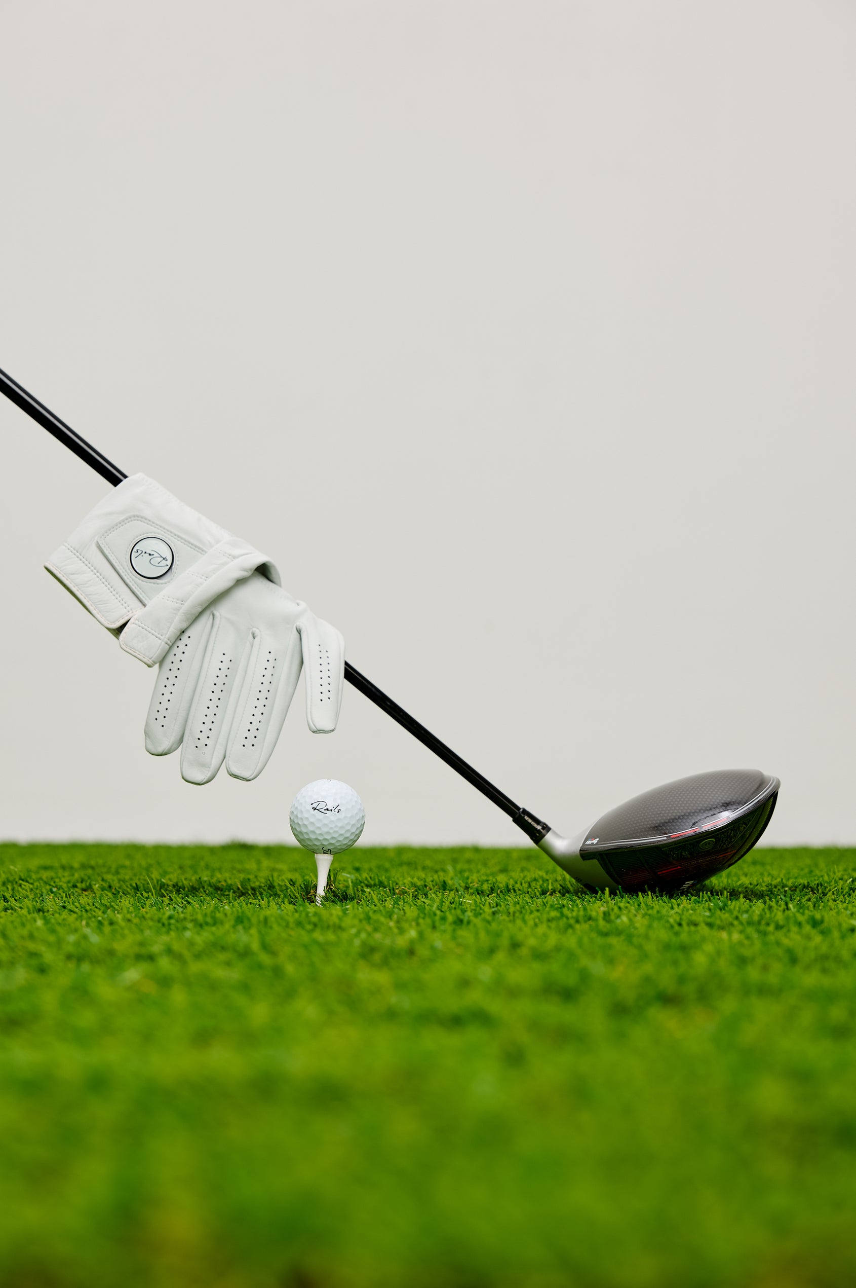 Right Handed Golf Gloves in Leather With Rails Logo Detail in White Colorway - Stylized Product View Featured