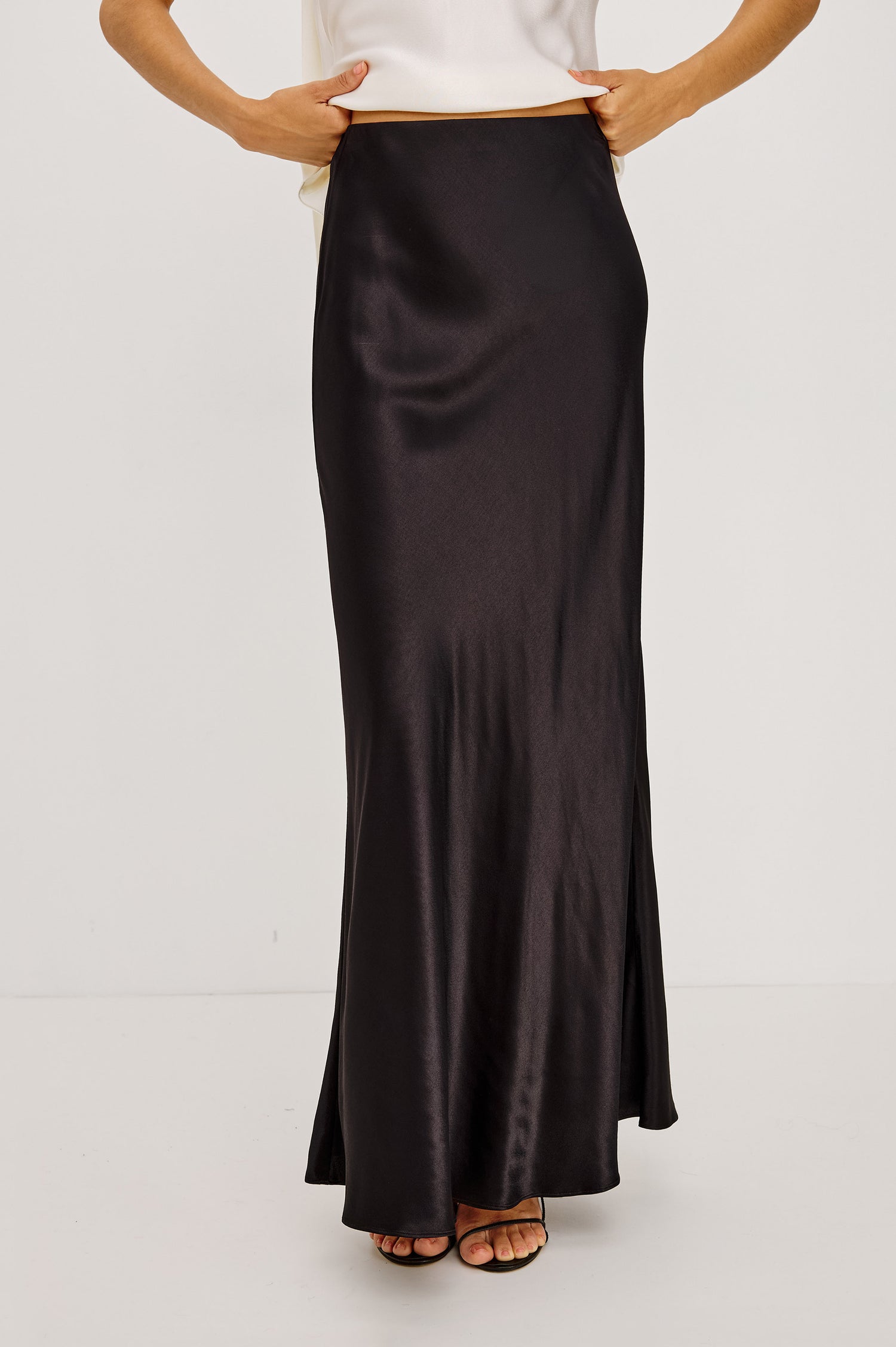 Romina Midi Skirt in Satin Back Crepe With Bias Cut in Ginger Spotted Colorway - Lower Body Front View Featured on Model