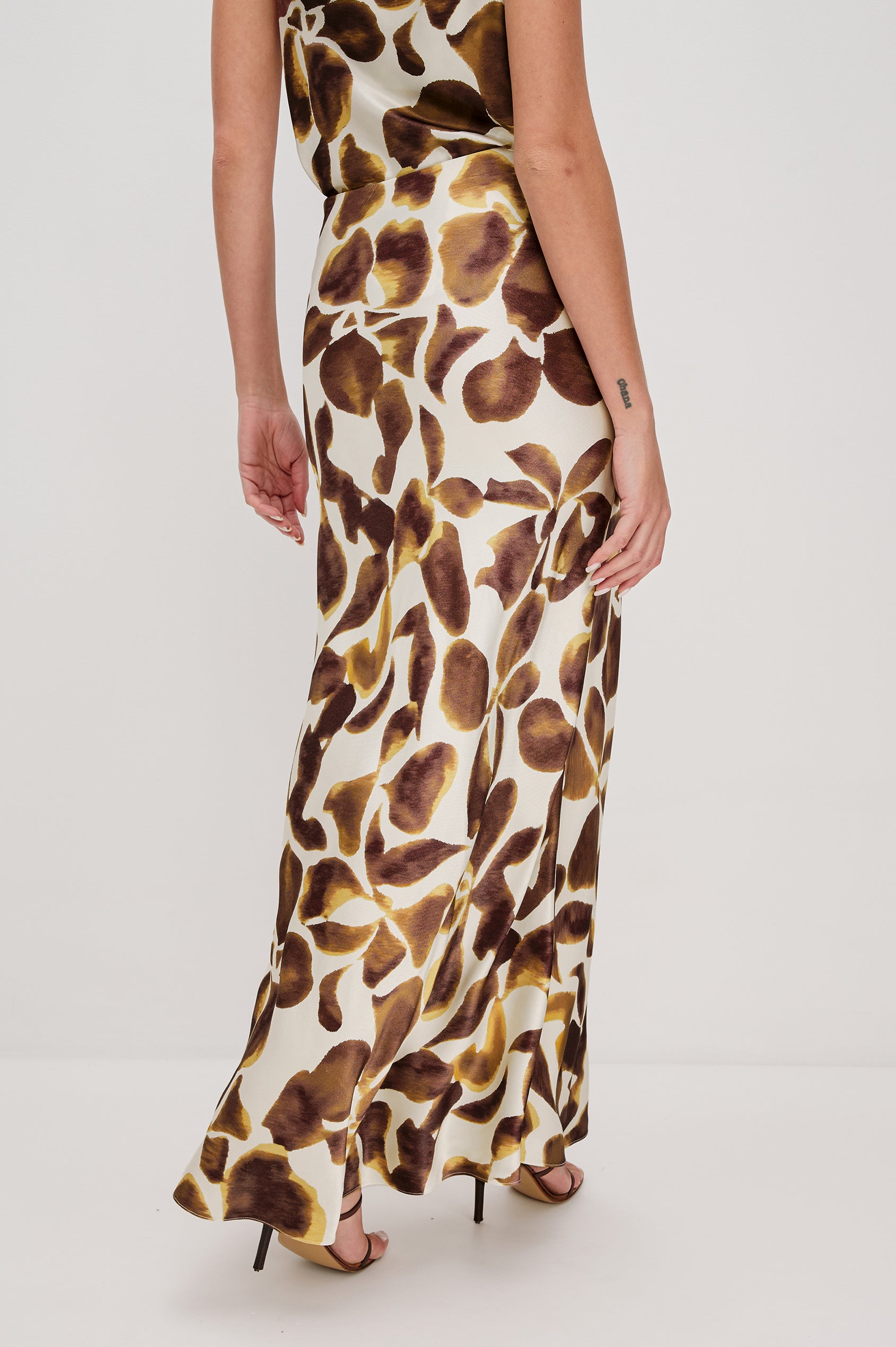 Romina Maxi Satin Skirt in Espresso Lily Colorway, Floral Print - Back View on Model
