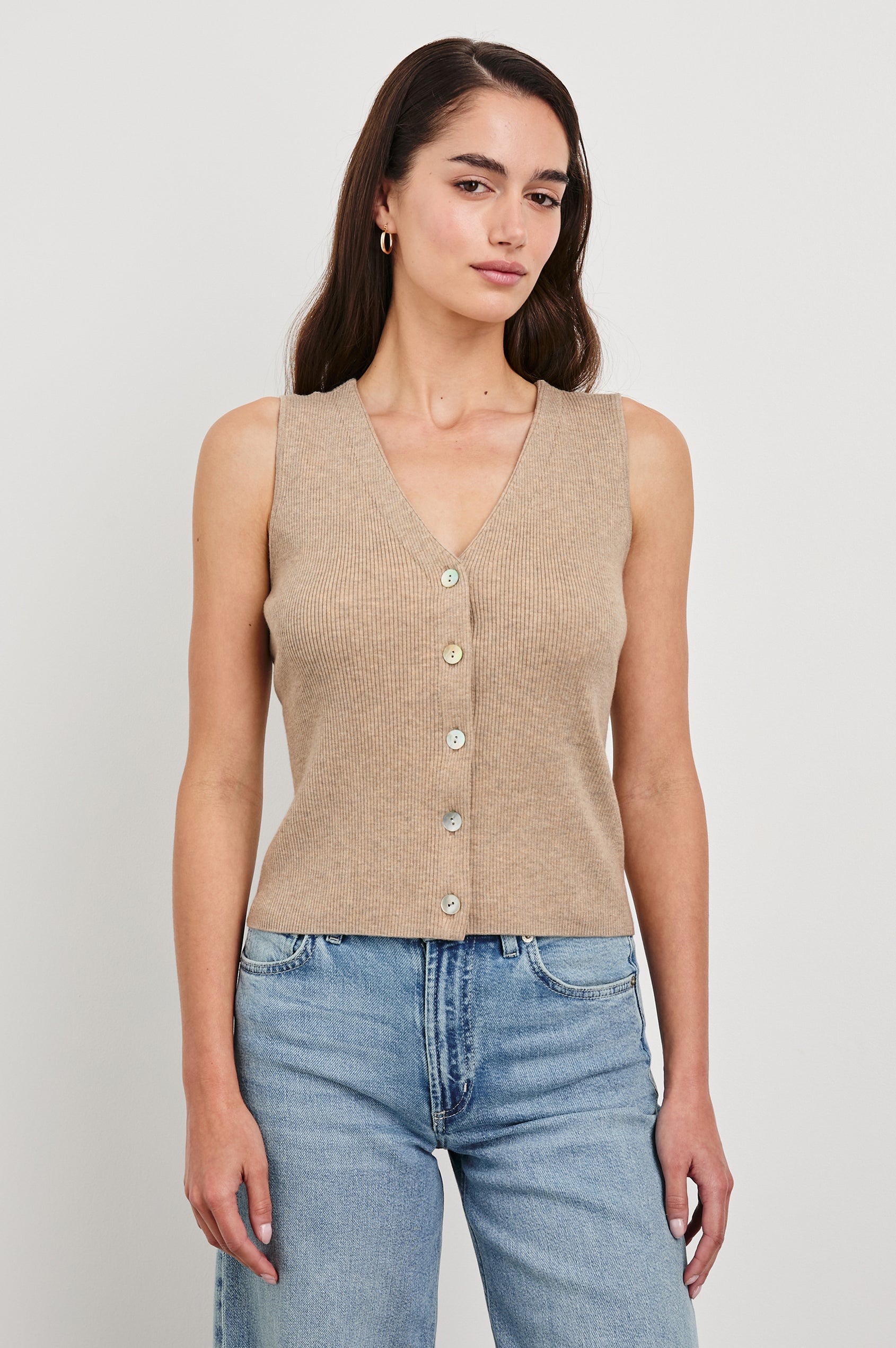 Rosa Ribbed Sleeveless Vest with a V Neckline and Buttons Down the Front in Oatmeal Colorway - Front View Featured on Model