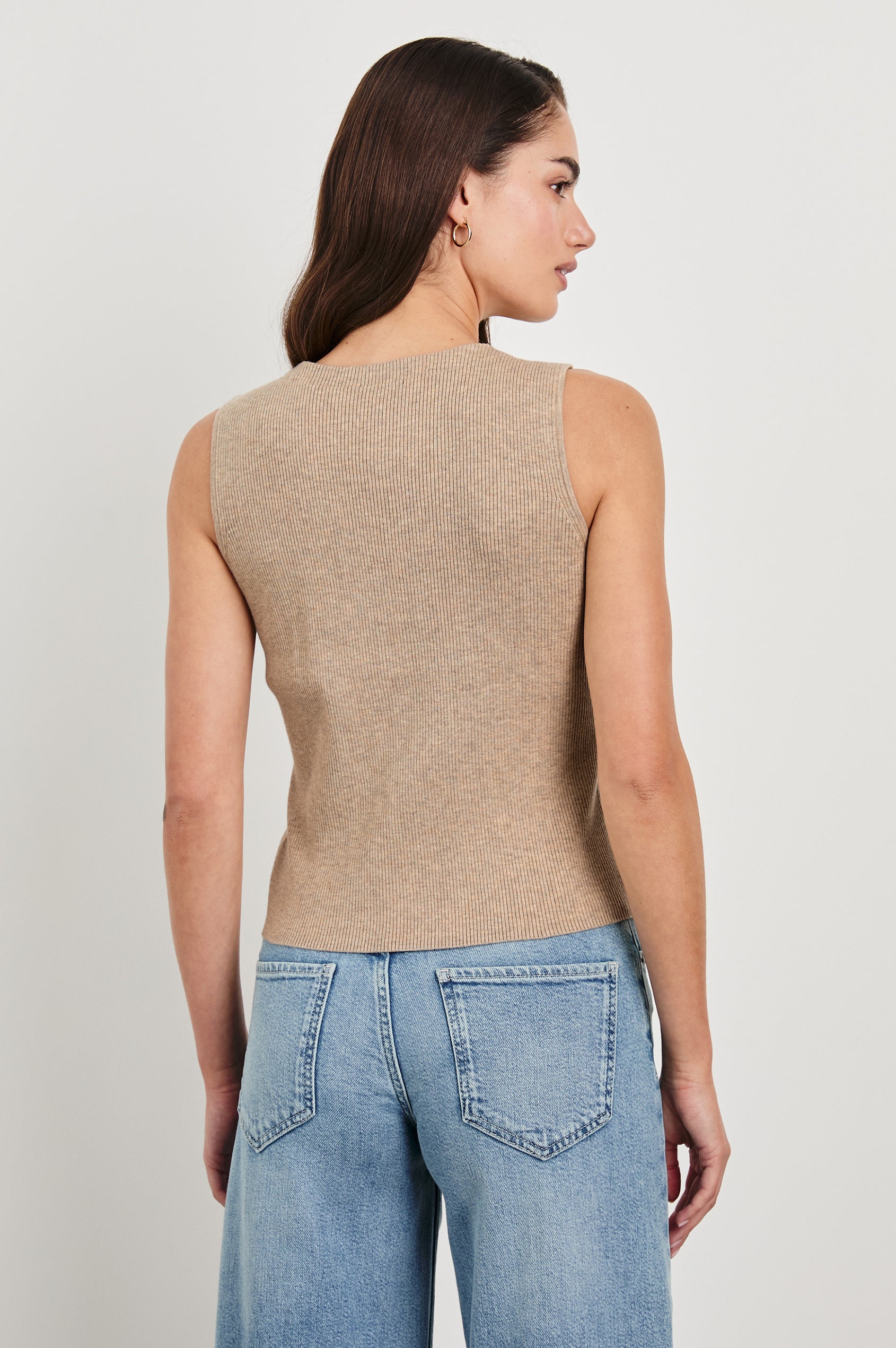 Rosa Ribbed Sleeveless Vest with a V Neckline and Buttons Down the Front in Oatmeal Colorway - Back View Featured on Model