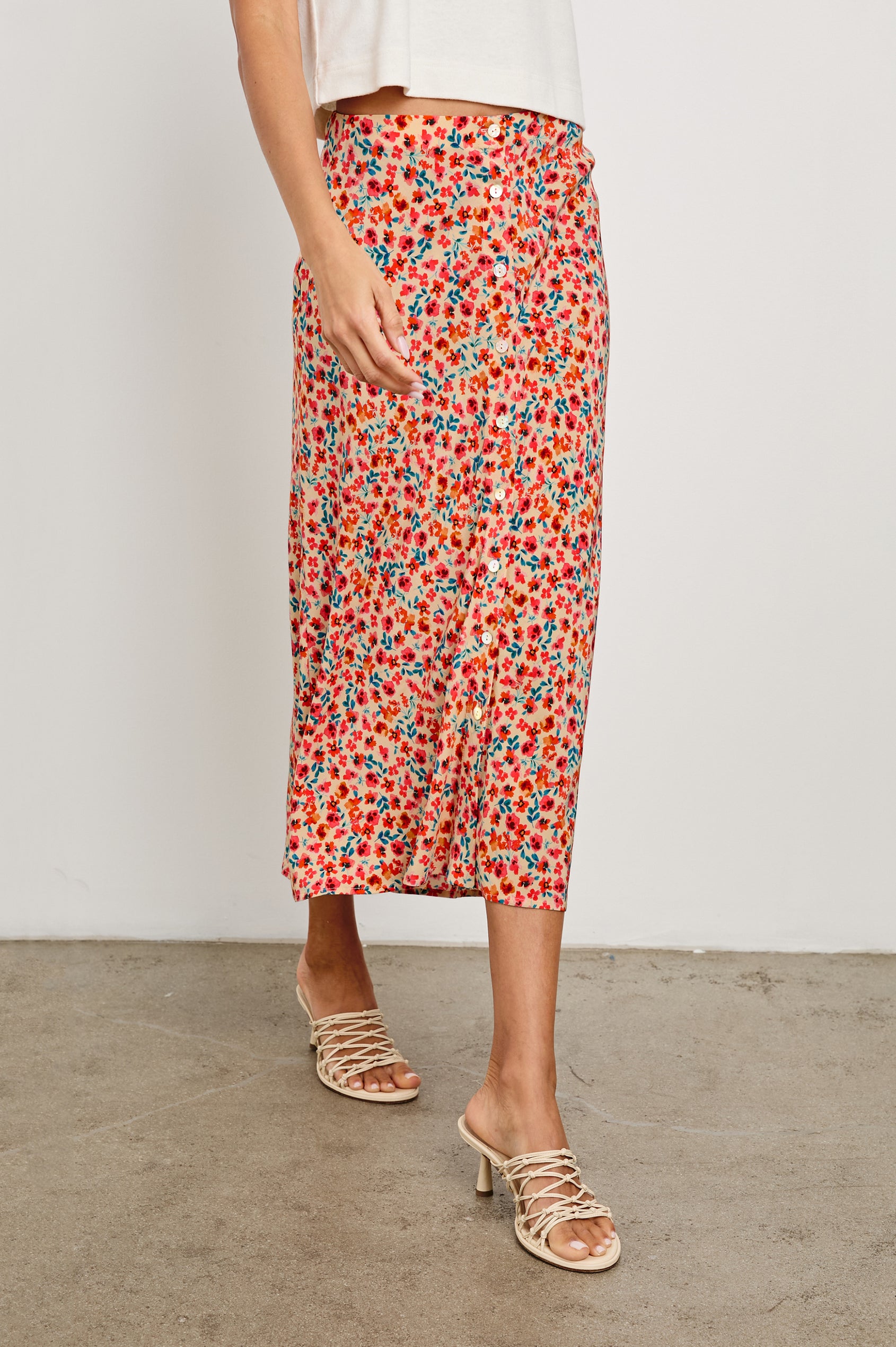 Rosetta Midi Skirt with White Buttons Down the Front in Red Posy Colorway, with Red Posies on Tan - Front View Featured on Model 