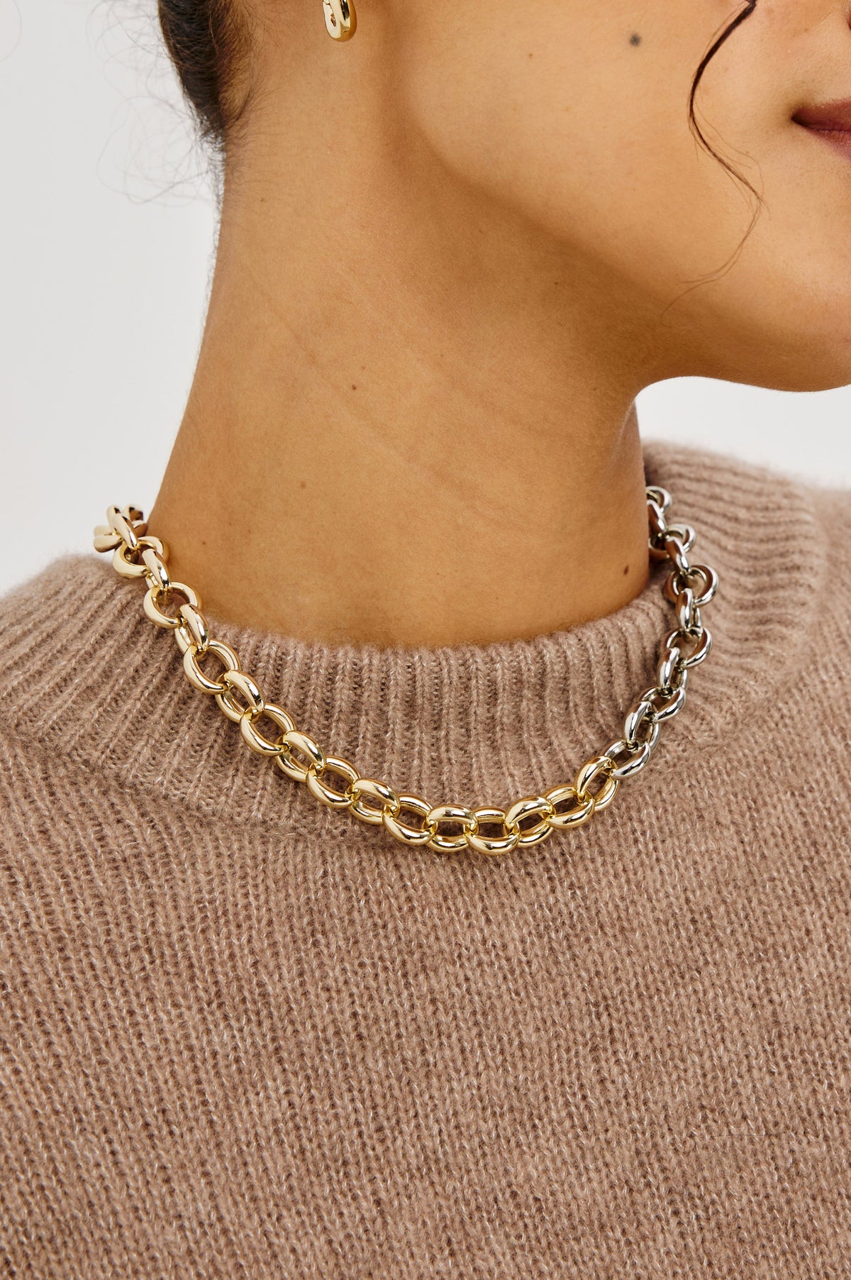 Round Link Chain Necklace With Chunky Round Links With Mixed-Metal Design, Toggle Closure, and Engraved Rails Logo at Interior in Silver Gold Colorway - Front view featured on model.