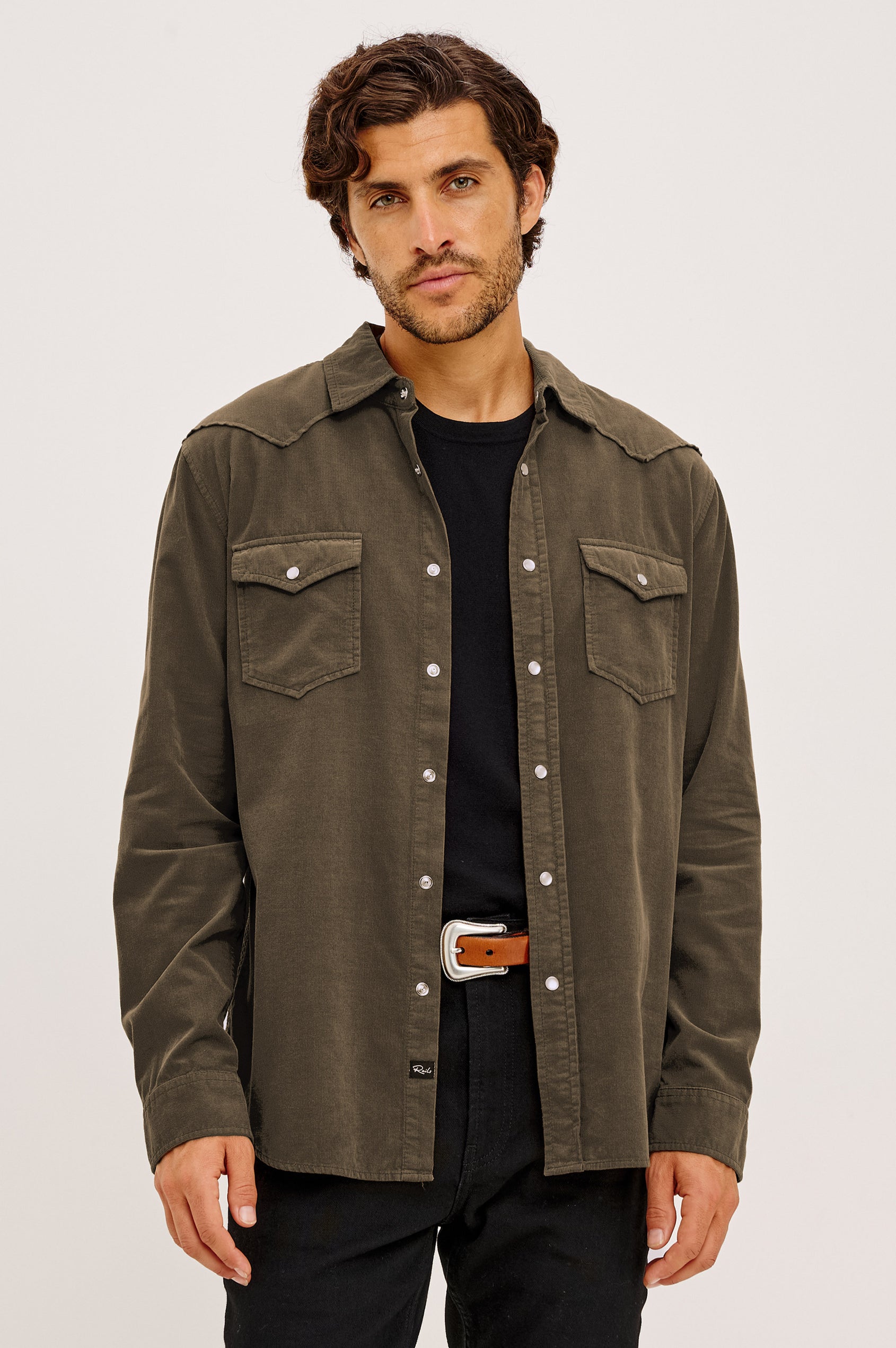 Roy Shirt in Fine Wale Corduroy With Western Shoulder and Back Yokes, Spread Collar, Snap Front, Dual Chest Flap Pockets, and Shirttail Hem in Acacia Colorway - Upper Body Front View Featured on Model