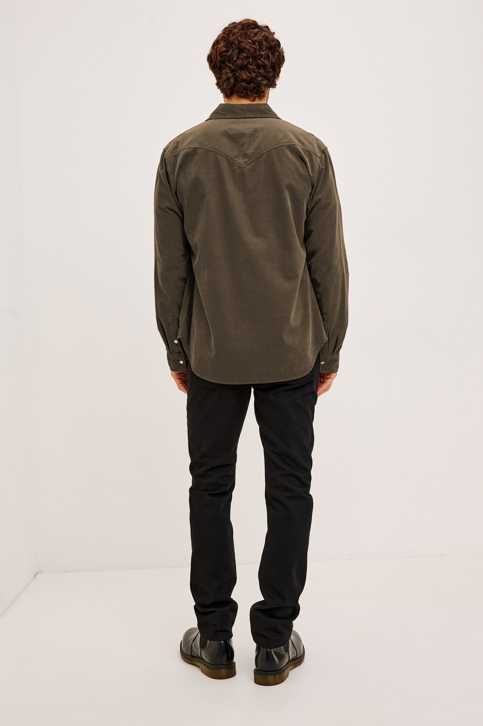 Roy Shirt in Fine Wale Corduroy With Western Shoulder and Back Yokes, Spread Collar, Snap Front, Dual Chest Flap Pockets, and Shirttail Hem in Acacia Colorway - Full Body Back View Featured on Model