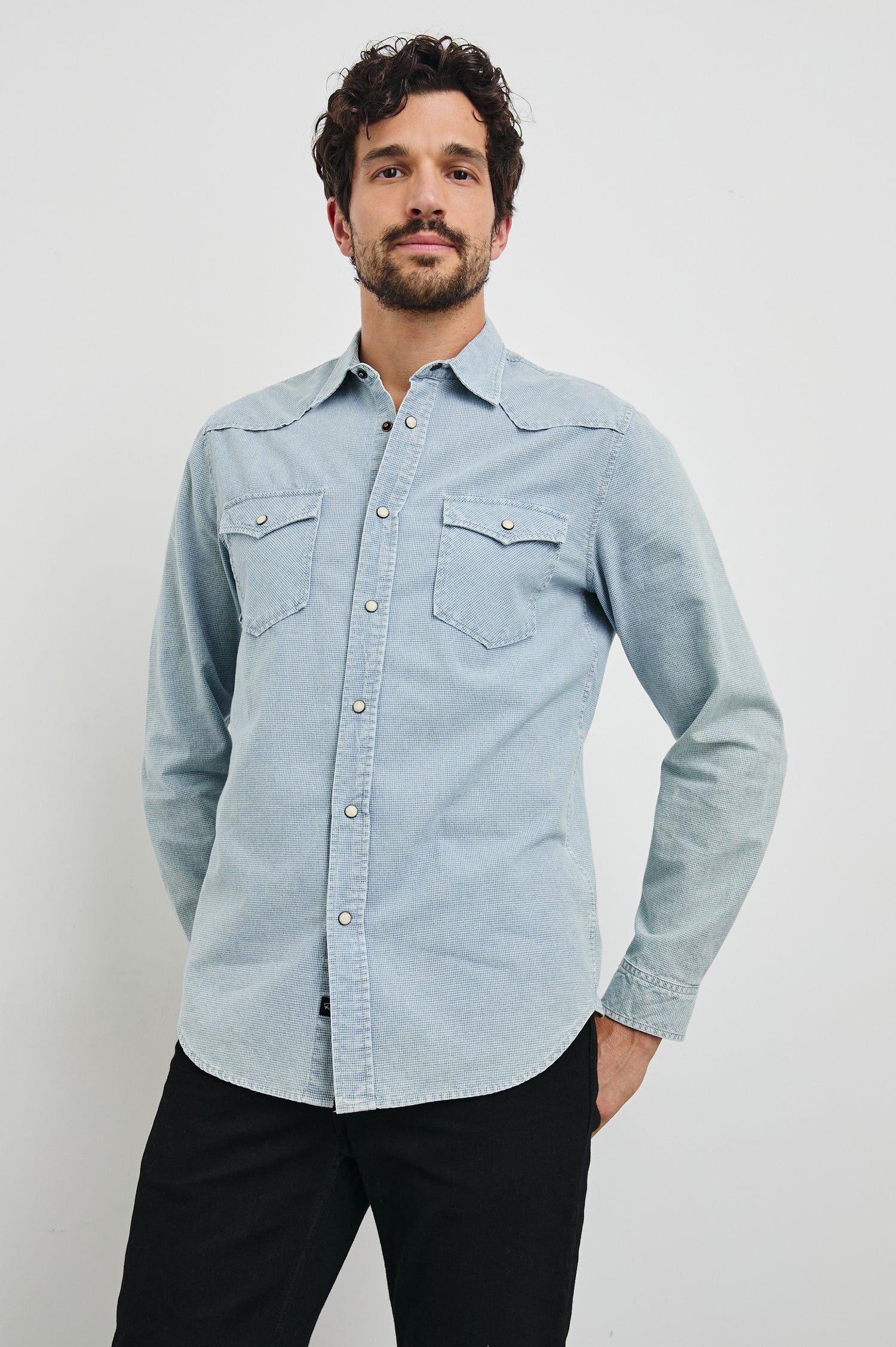 Roy Long-Sleeve with Snap Closure, Two Chest Snap Flap Pockets and Traditional Western Yokes in Sunfaded Indigo Colorway - Front View Featured on Model   