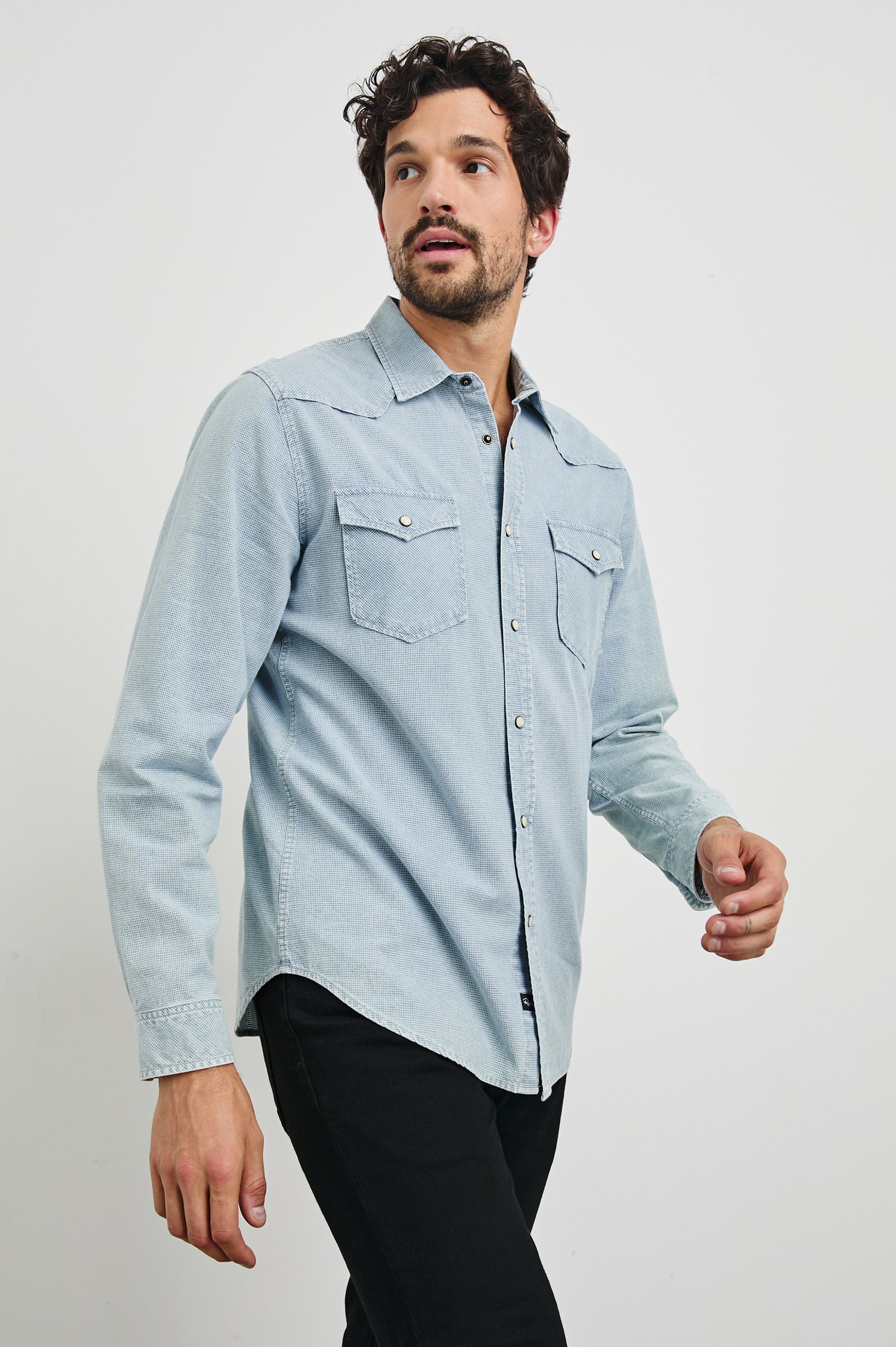 Roy Long-Sleeve with Snap Closure, Two Chest Snap Flap Pockets and Traditional Western Yokes in Sunfaded Indigo Colorway - Front View Featured on Model   