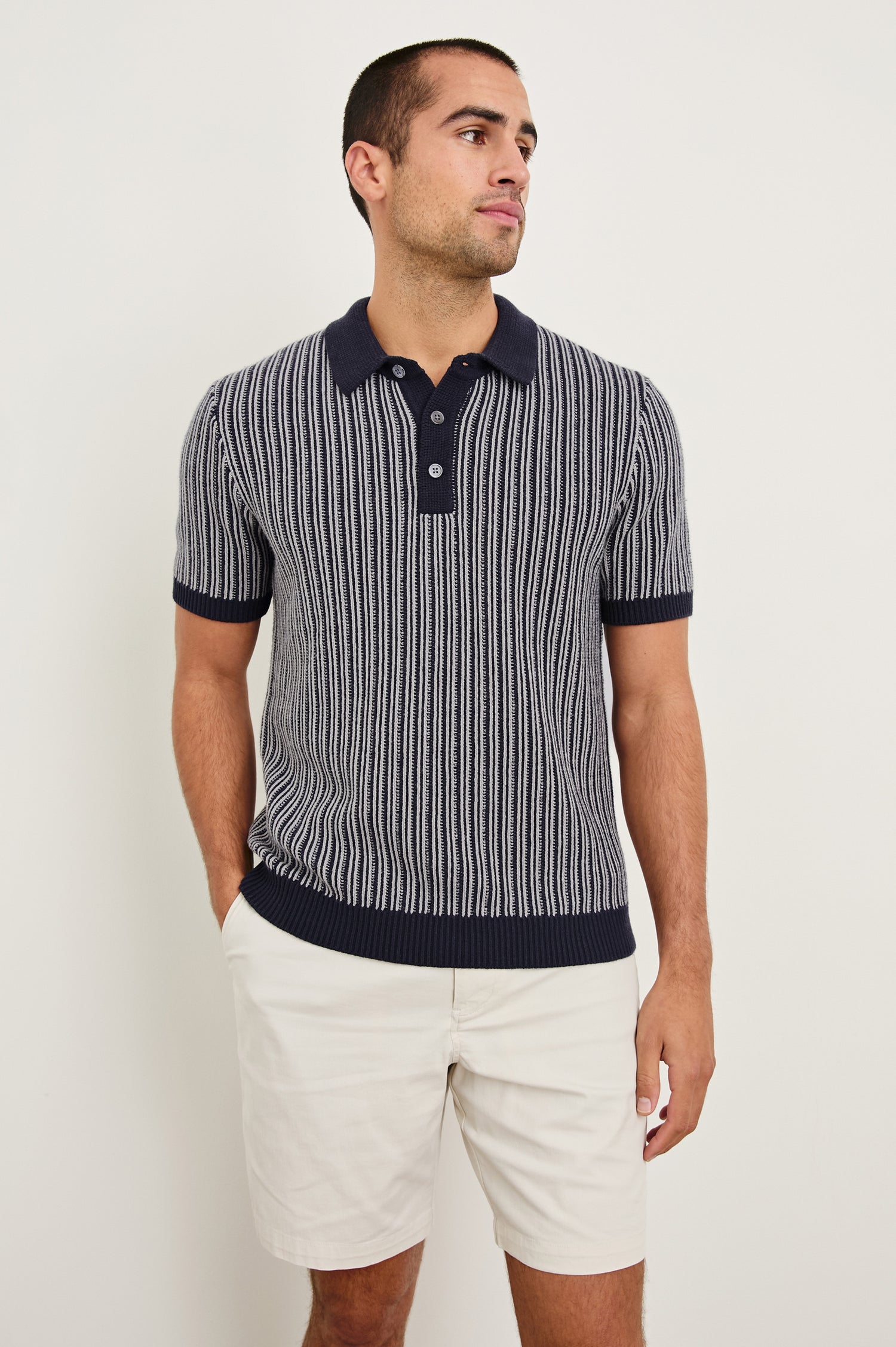 Royce ribbed knit short sleeve polo with three front buttons and a collar in Navy Grey - front view on model
