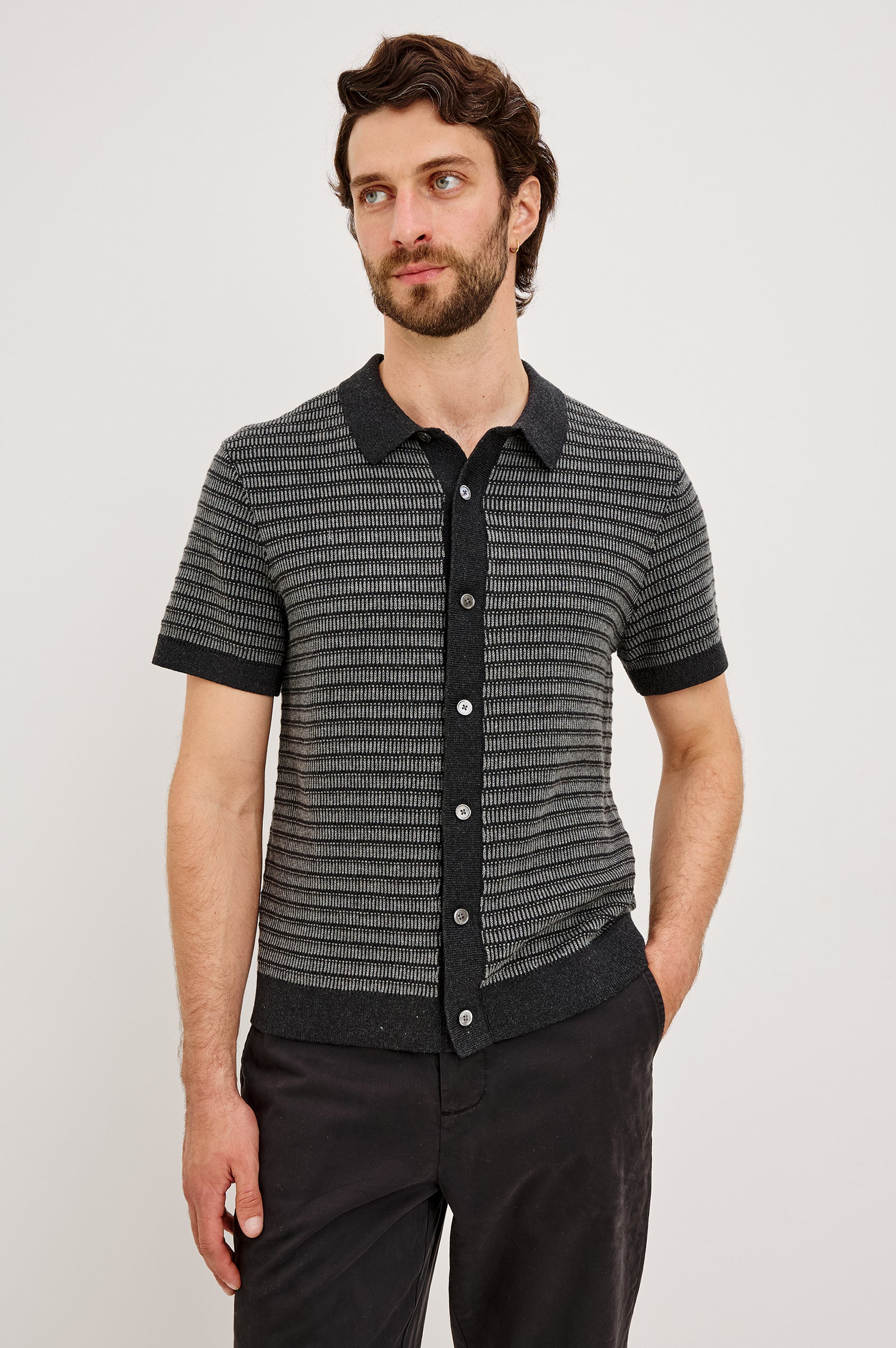 Rubin Shirt in Cotton Knit WIth Short Sleeves, Full Button Placket, Ribbed Collar, and Tonal Texture in Charcoal Black Stripe Colorway - Upper Body Front View Featured on Model