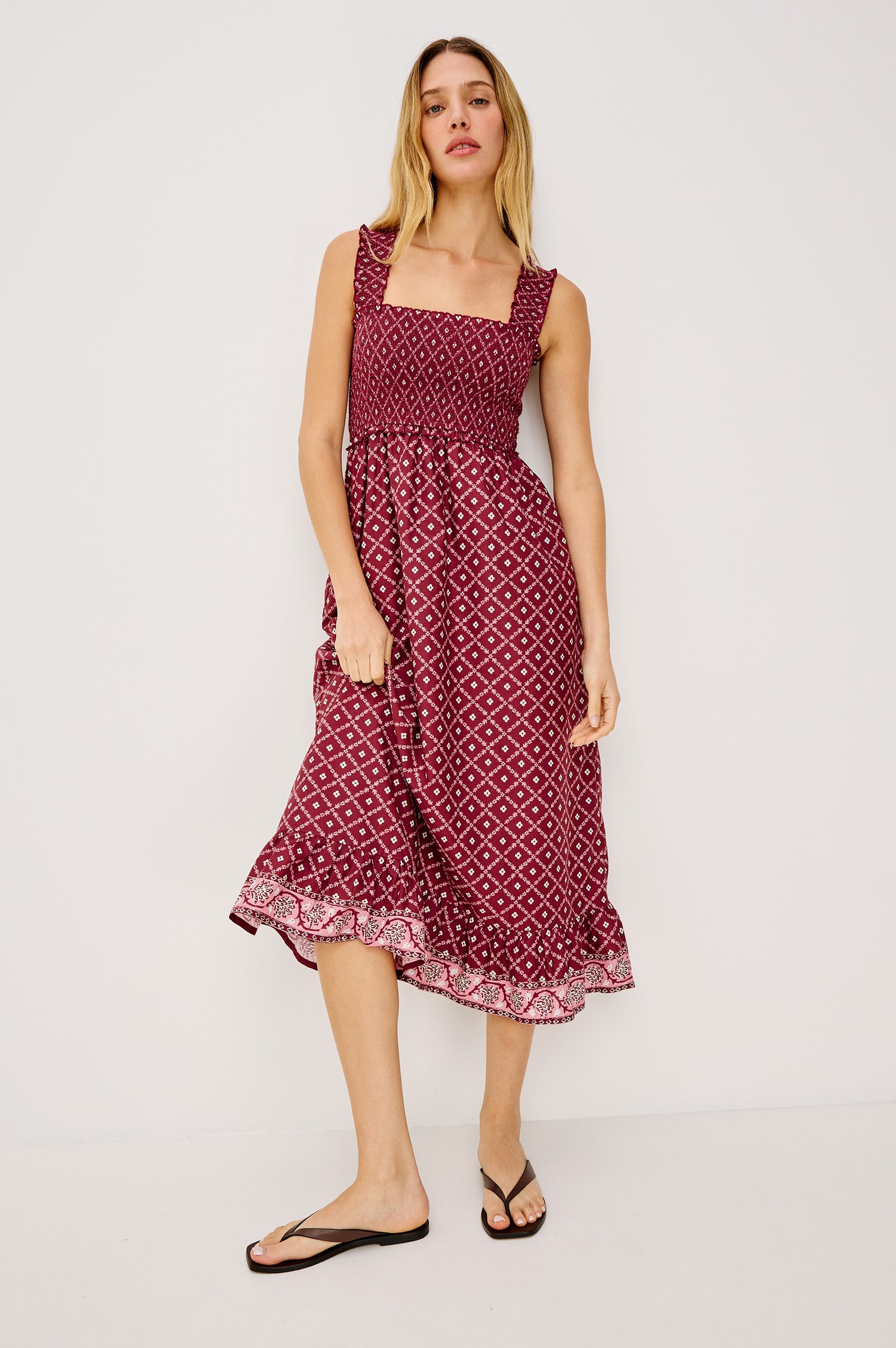Rumi Midi Dress in Cotton Voile With Smocked Shoulder Straps and Bust, Empire Waist, and Ruffle Hem in Flower Chain Colorway - Full Body Front View Featured on Model