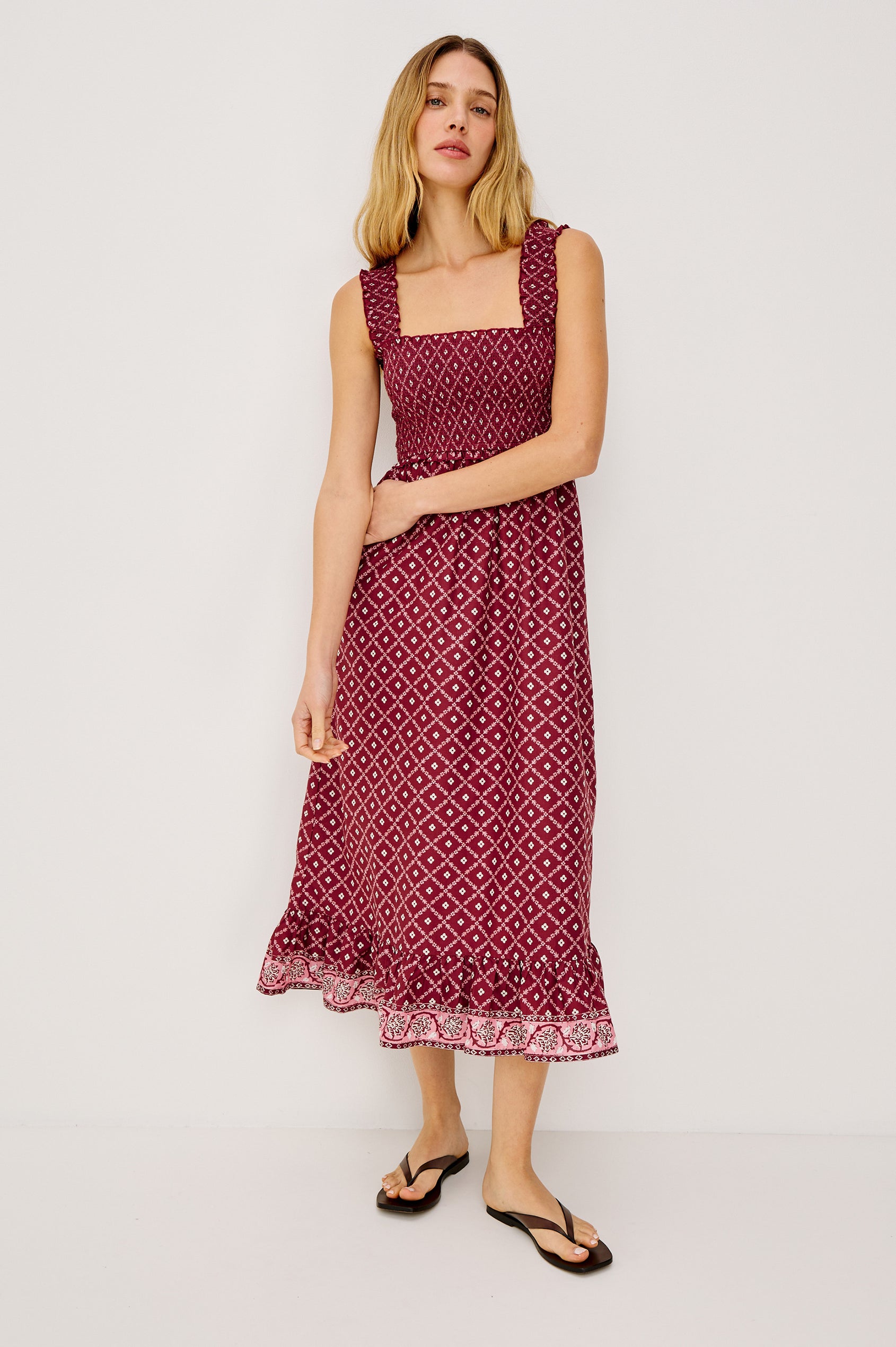 Rumi Midi Dress in Cotton Voile With Smocked Shoulder Straps and Bust, Empire Waist, and Ruffle Hem in Flower Chain Colorway - Full Body Front View Featured on Model