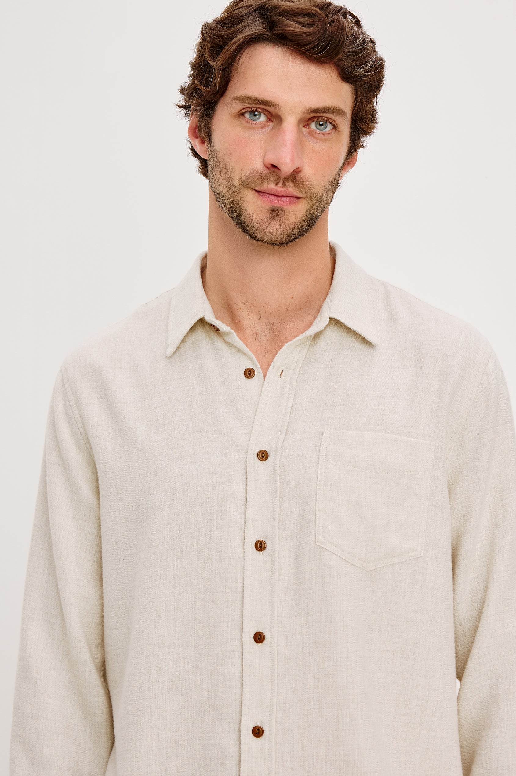 Runson Long-Sleeve Button Down with a Chest Patch Pocket in Cream Heather Colorway - Front Detail View Featured on Model
