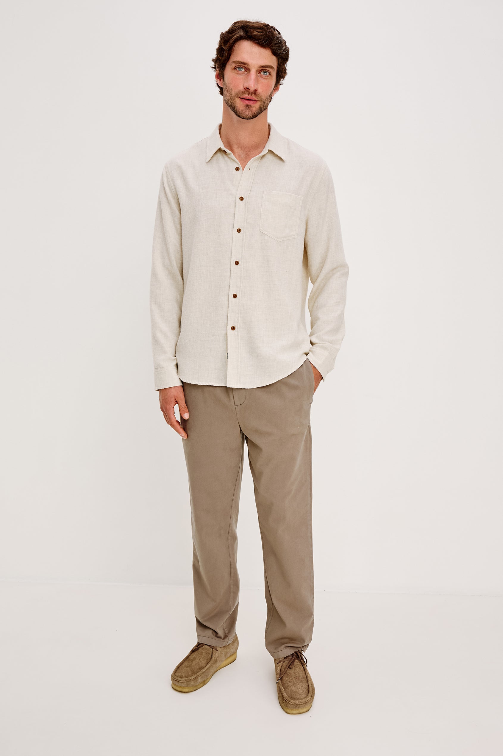 Runson Long-Sleeve Button Down with a Chest Patch Pocket in Cream Heather Colorway - Front Full Body View Featured on Model