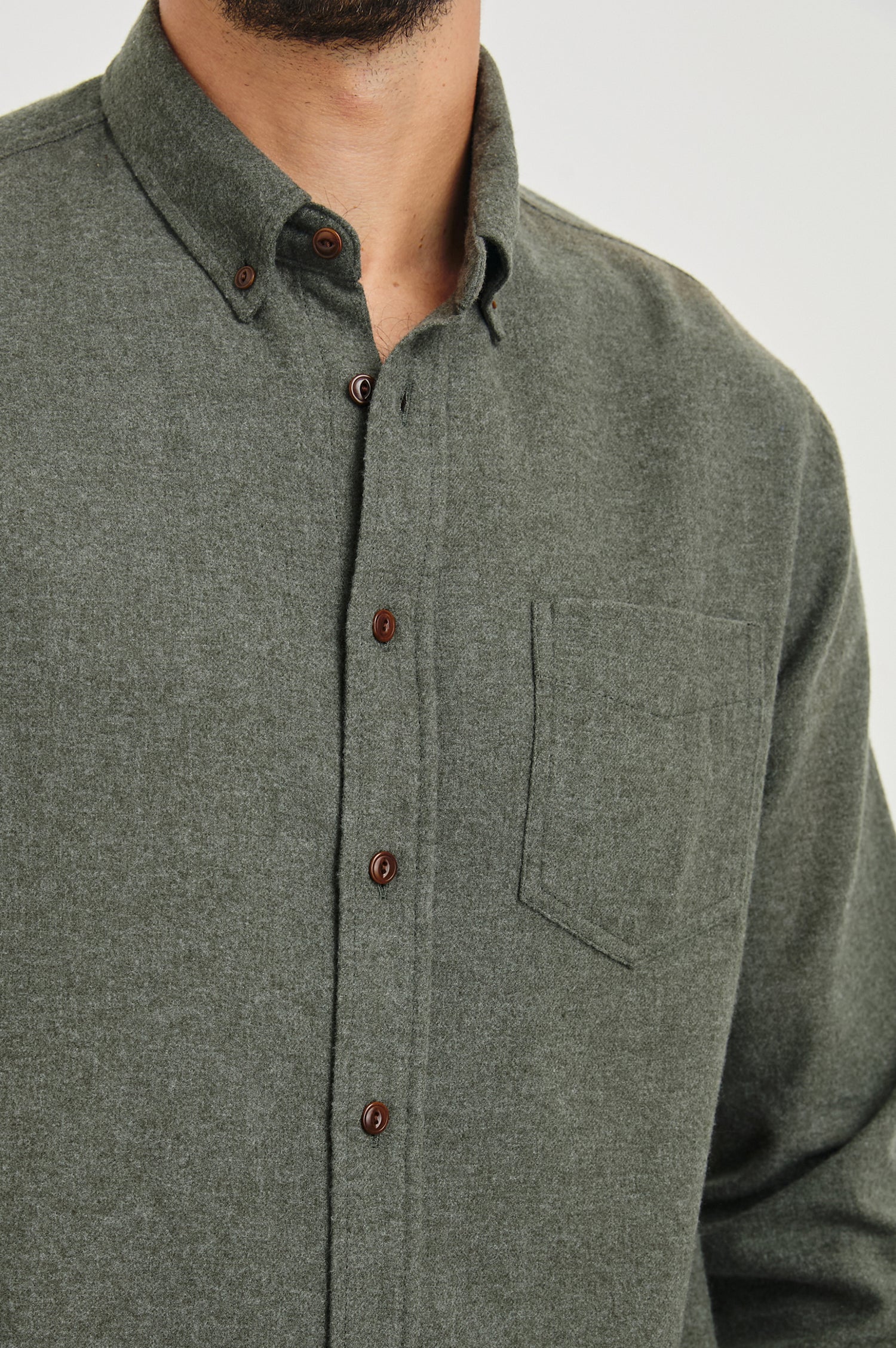 Runson Long-Sleeve Button Down with a Chest Patch Pocket in Heather Green Colorway - Front View Featured on Model