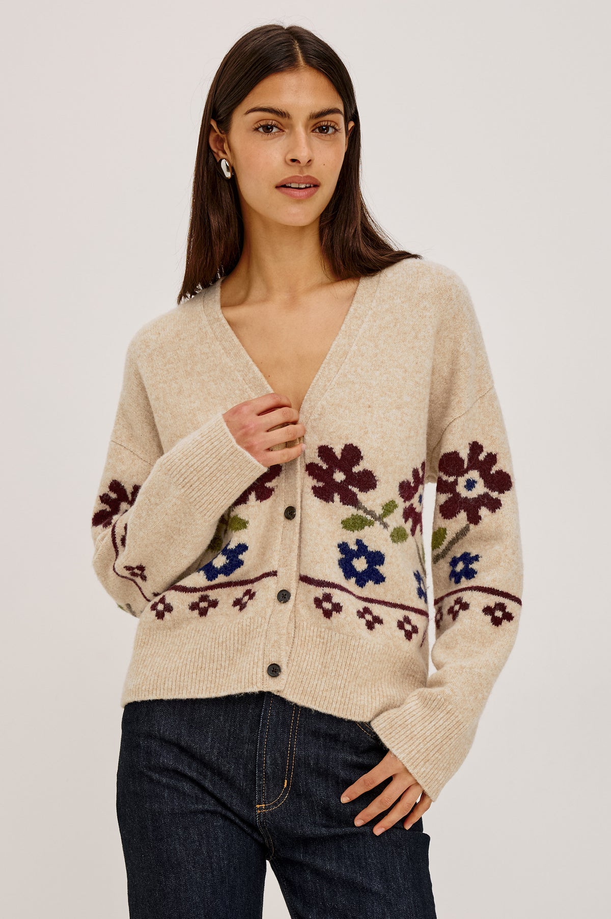 Saffron Cardigan in Wool Blend Knit With Relaxed Slightly Oversized Fit, Front Buttons, and Ribbed Trim in Oat Floral Colorway - Upper Body Front View Featured on Model.