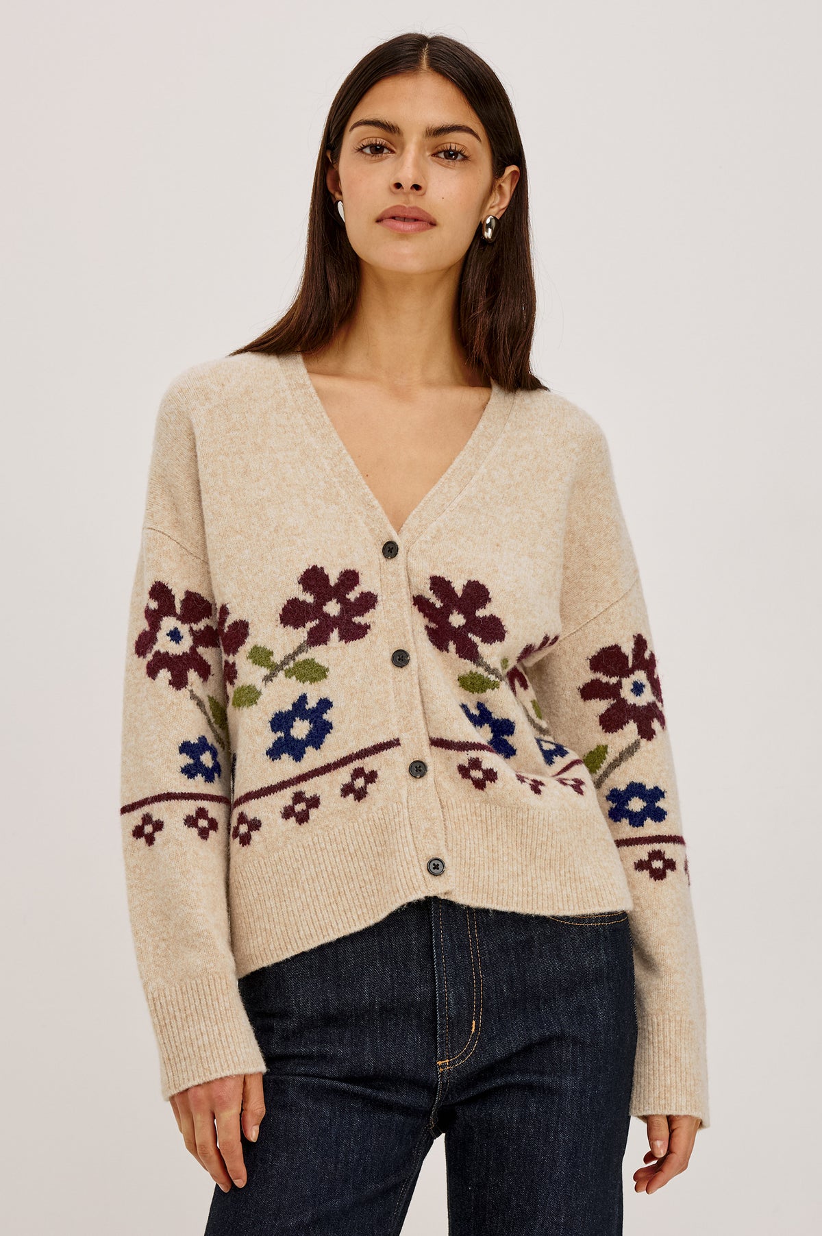 Saffron Cardigan in Wool Blend Knit With Relaxed Slightly Oversized Fit, Front Buttons, and Ribbed Trim in Oat Floral Colorway - Front View Featured on Model.