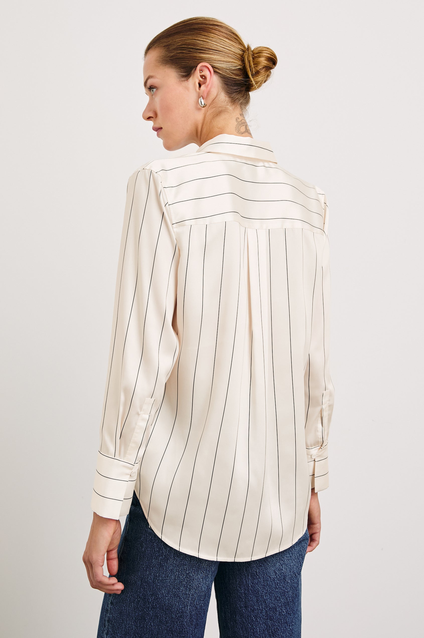 Saige Long-Sleeve Button Up in Brixton Stripe Colorway, Thin Black Stripes on Cream - Back View Featured on Model
