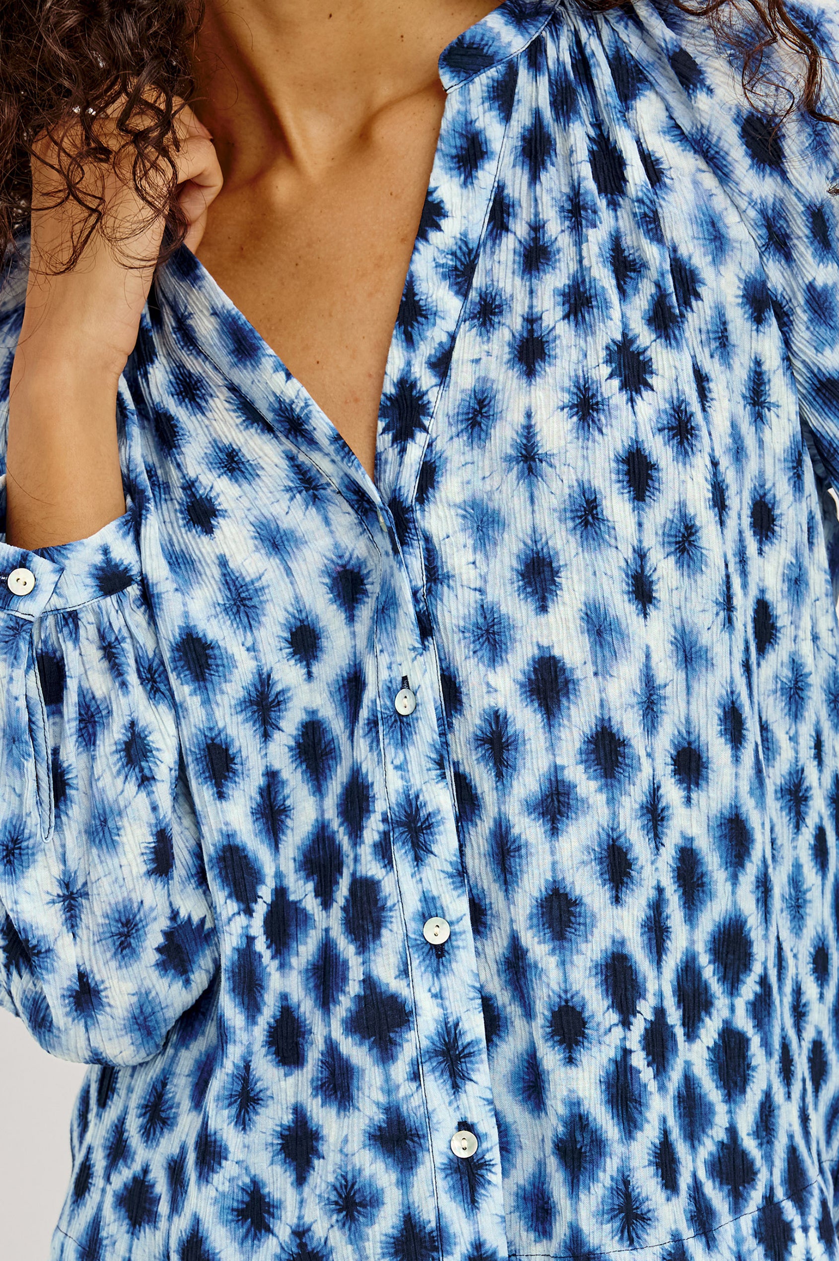 Saint Shirt in Lightweight Crinkle Chiffon With Loose Fit, Split V-Neckline, Button Front, and 3/4-Length Raglan Puff Sleeves in Sapphire Shibori Colorway - Upper Body Front View Featured on Model