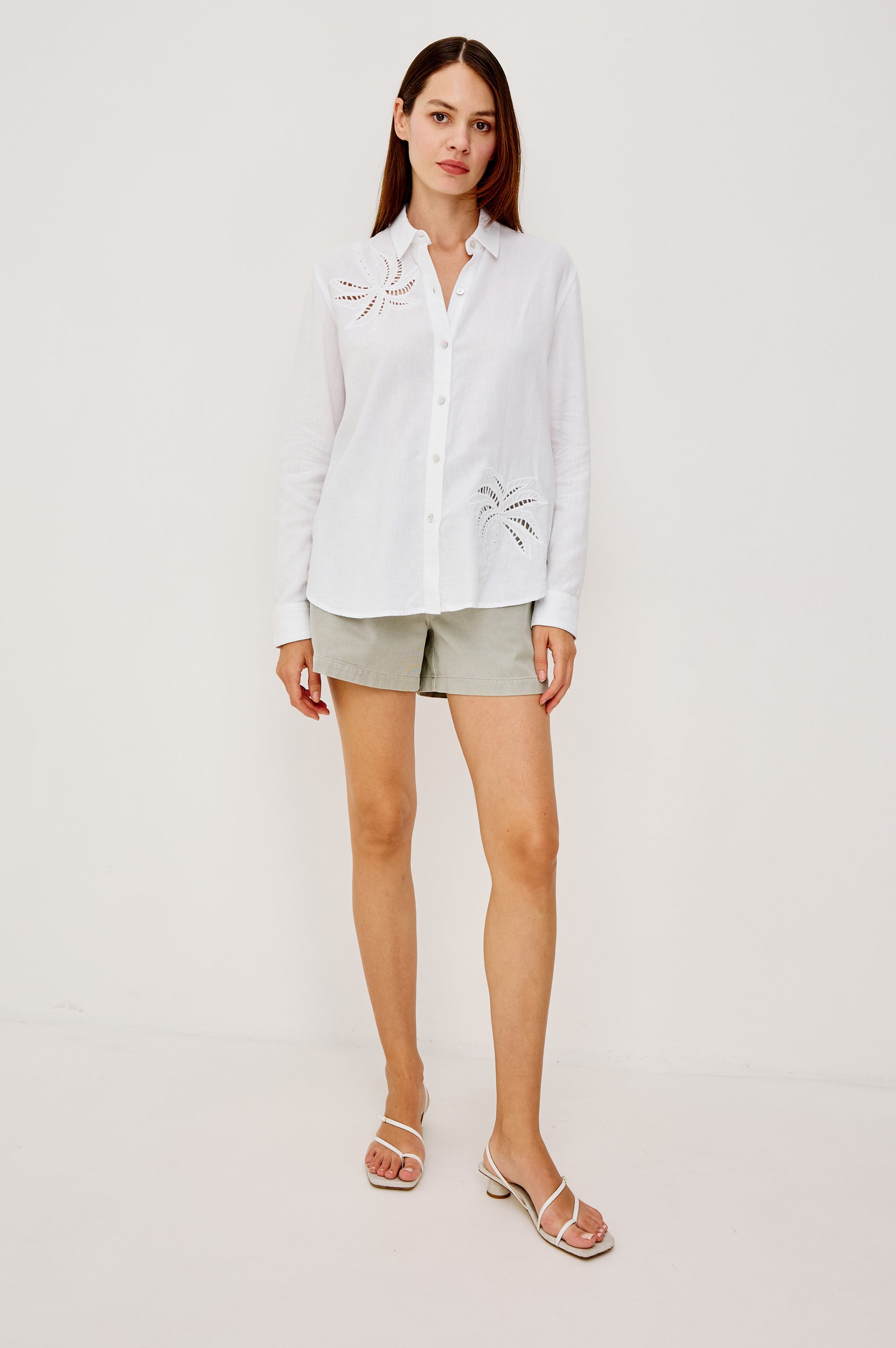 Samar Button-Up Collared Shirt in Linen With Palm Tree Eyelet Embroidery, Relaxed Fit, and Long Sleeves in White Palm Embroidery Colorway - Full Body Front View Featured on Model