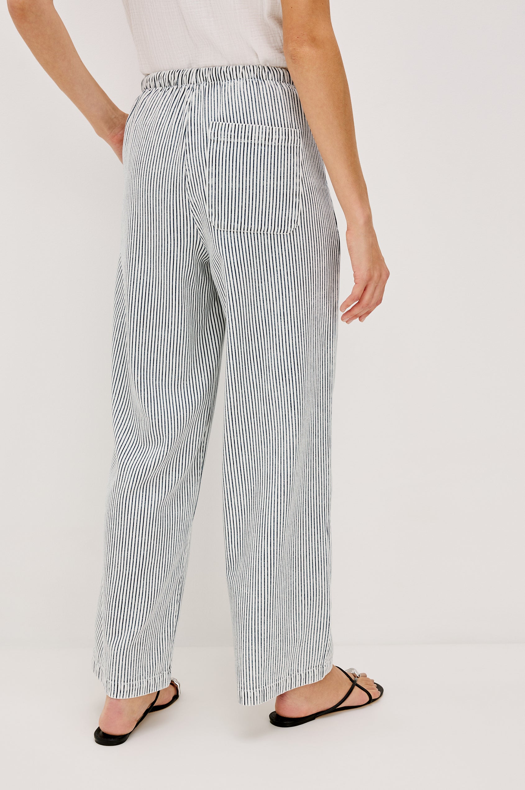 Sanderson Pull on Wide Leg Pant with a Drawstring Waistband and Side Pockets in Indigo Railroad Stripe Colorway. Back View Shown on Model.