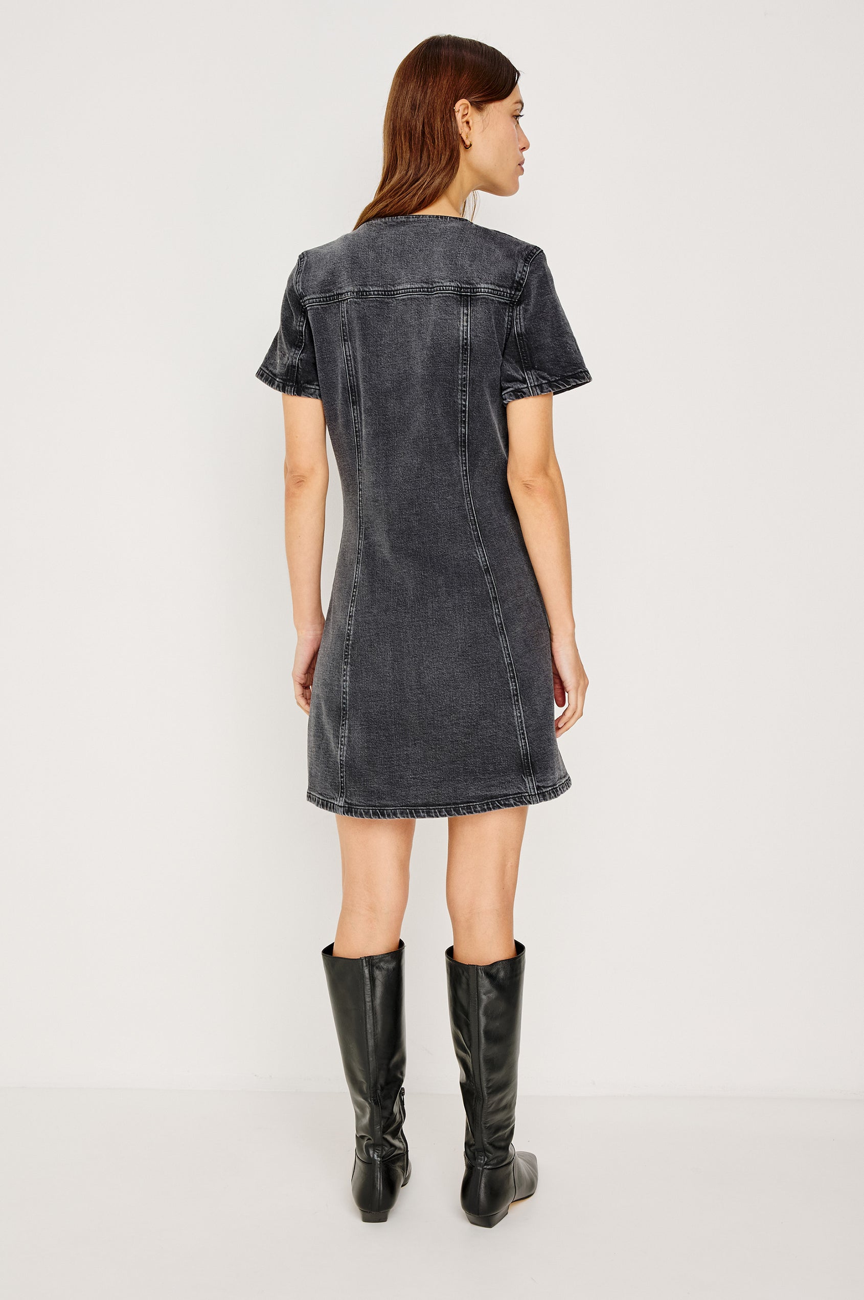 Saratoga Mini Denim Dress with a V-Neck, Short Sleeves, Button Front, Chest Flap Pockets in Washed Black Colorway. Back View Shown on Model.