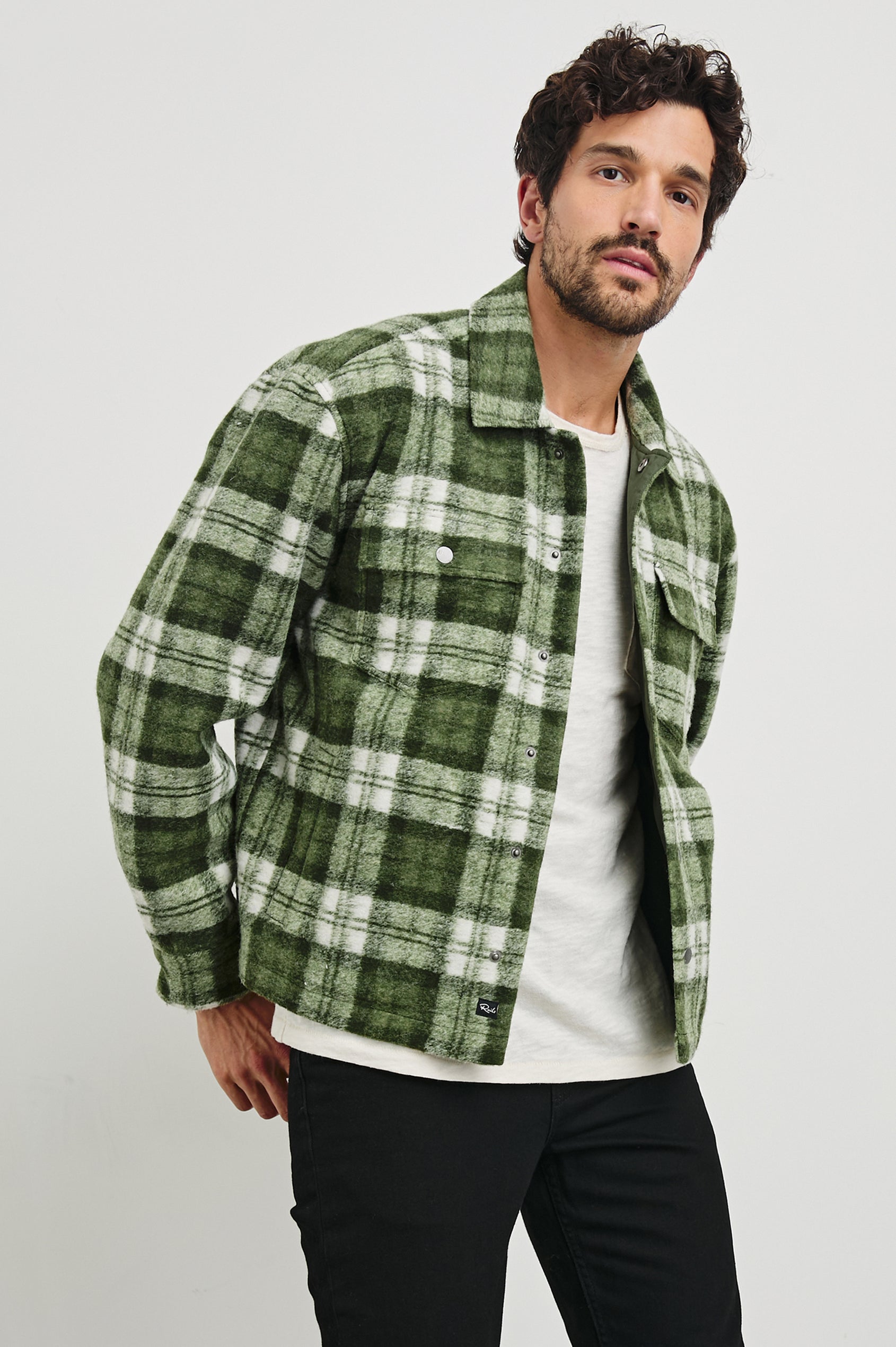 Saxon Jacket  with Snap Closure and Two Snap Chest Flap Pockets in Green Mist Colorway, a green and white plaid  - Front View Featured on Model