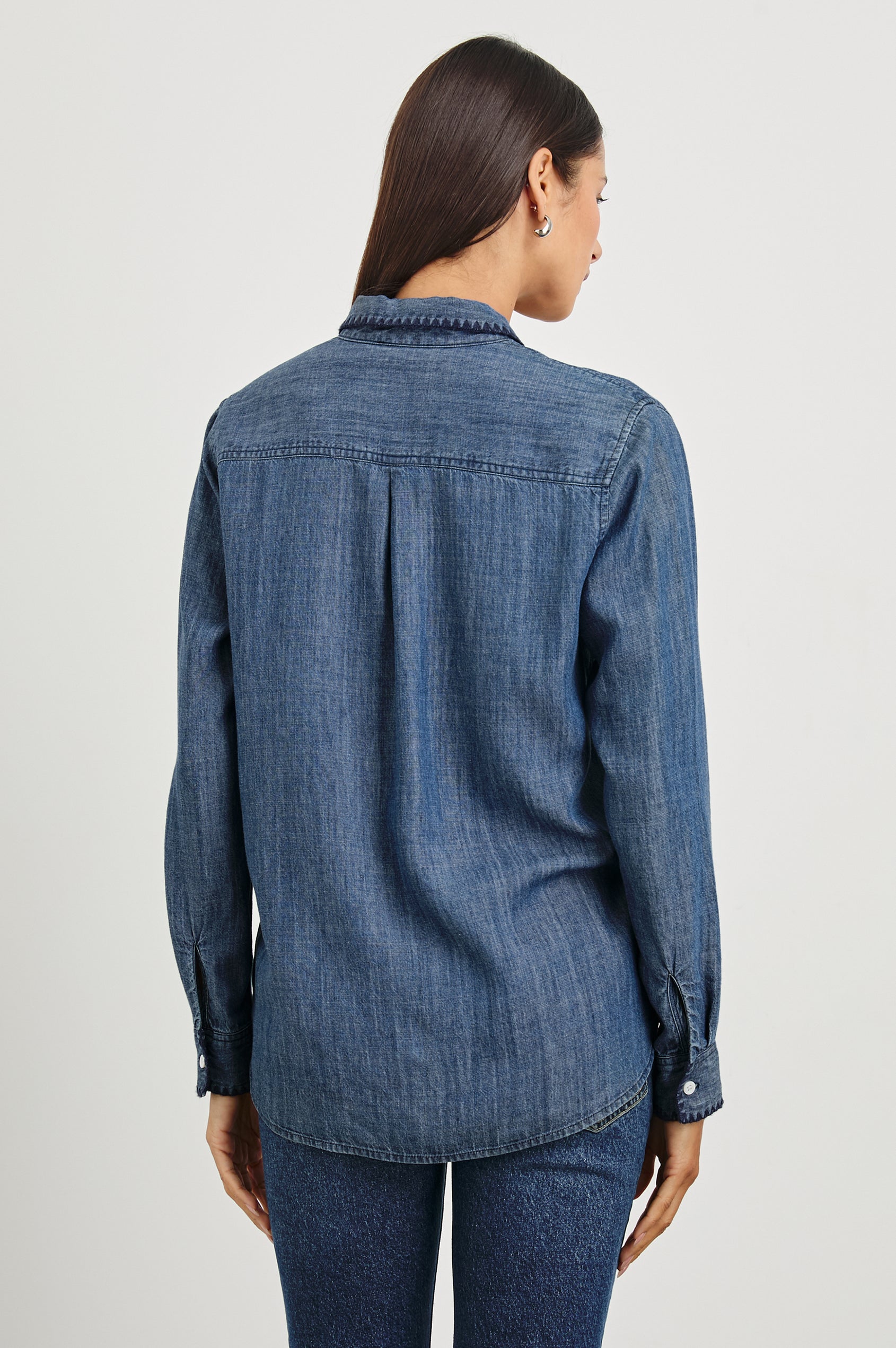 Saya Long-Sleeve, Button-Down Shirt with Collar, Buttoned Cuffs, Chest Patch Pocket, Black Blanket Stich Trim in Dark Vintage Wash Colorway - Back Untucked View Featured on Model