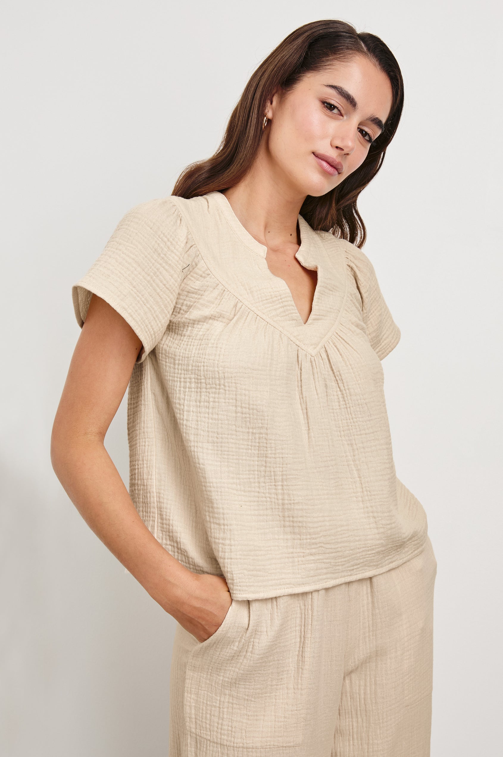 Sayer double cotton gauze flared short sleeve tee with V neckline in Flax - front view on model at slight angle