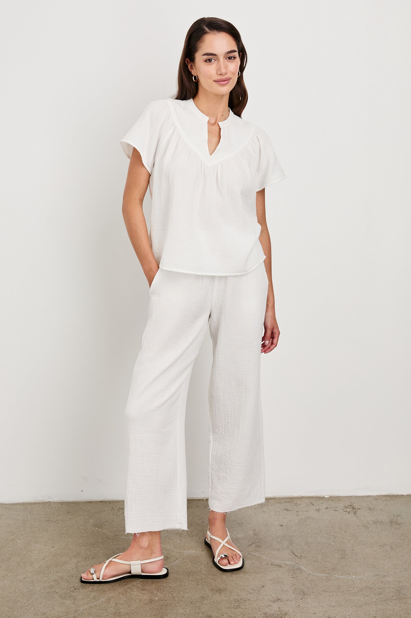 Sayer double cotton gauze flared short sleeve tee with V neckline in White - full body front view on model