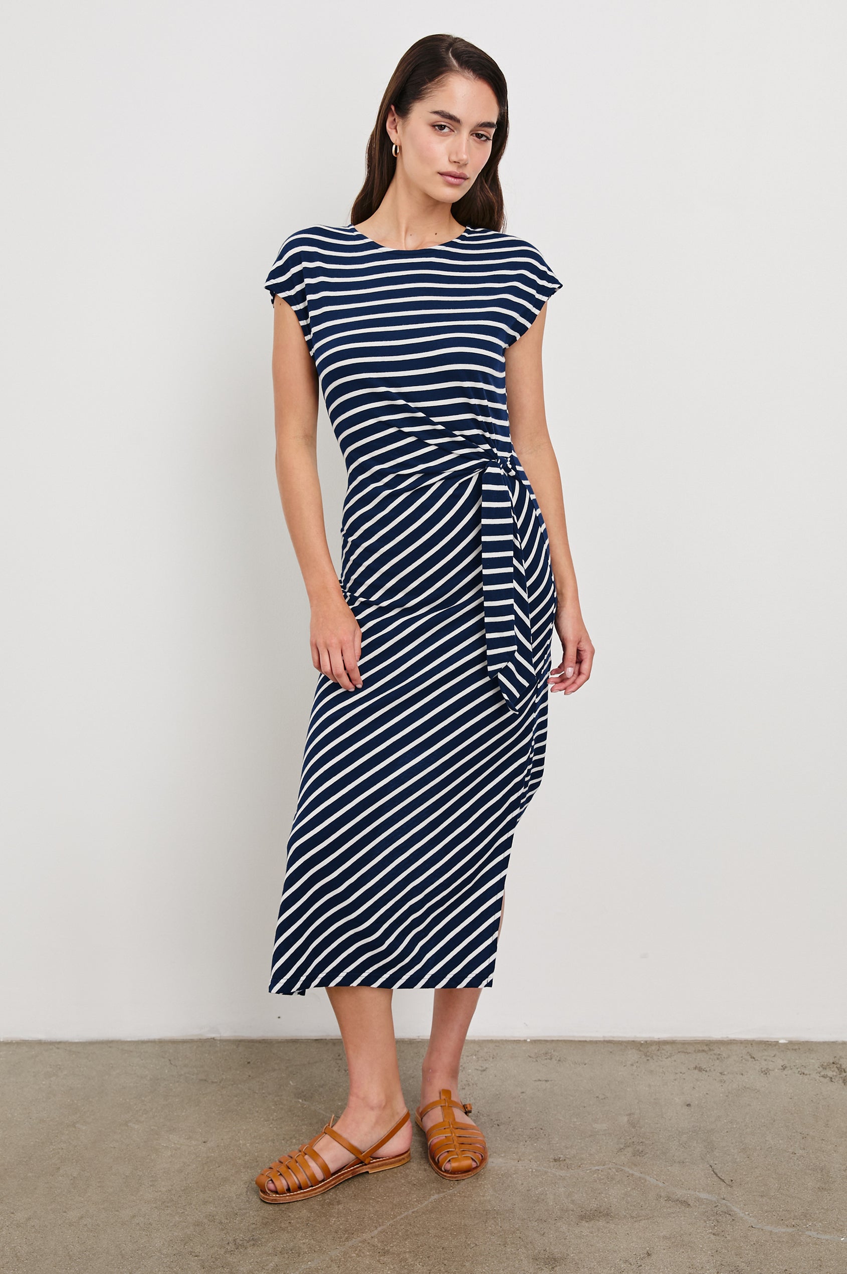 Selah Short Sleeve Jersey Dress With Side Tie In Colorway Navy Ivory Stripe -  Full Front Body View Featured On Model