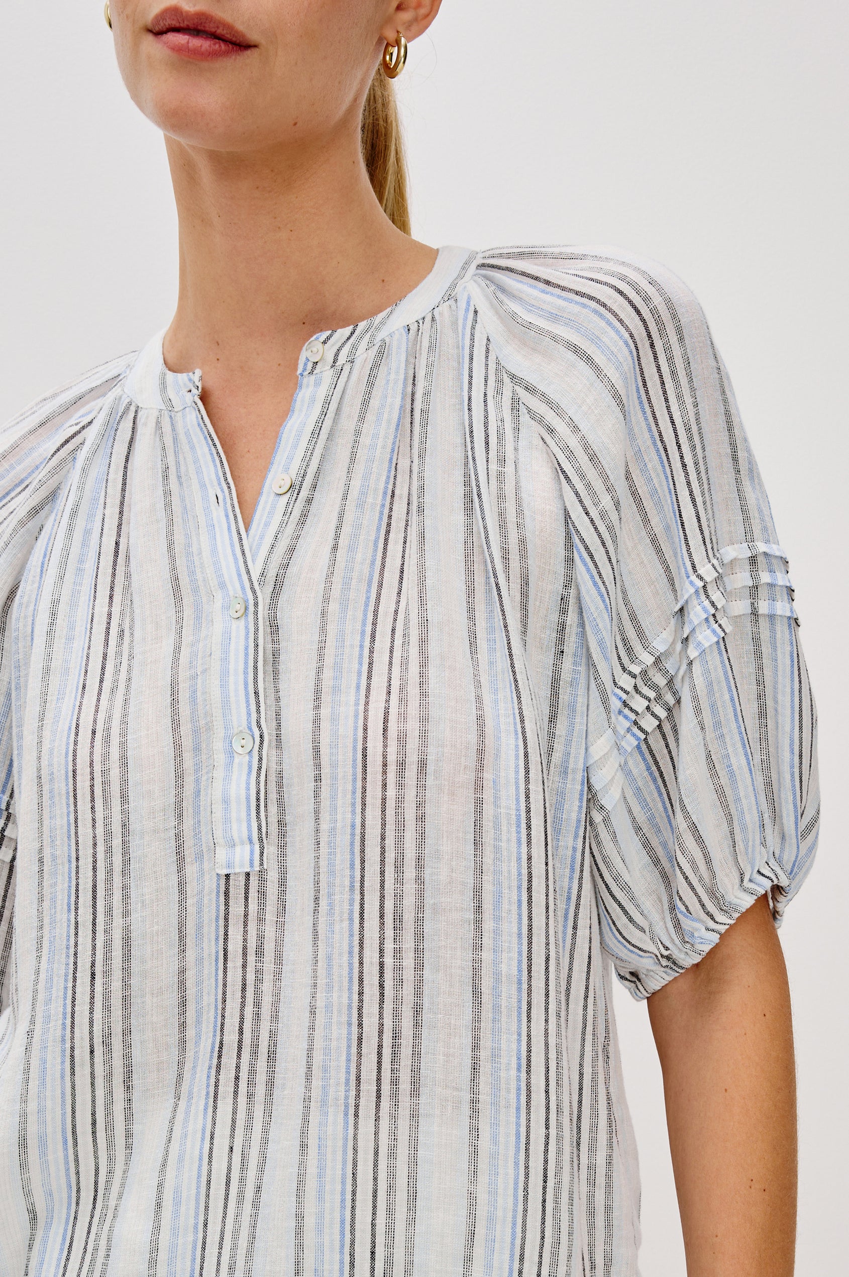 Shoshanna Pull Over Button Front Blouse with Elbow Length Raglan Blouson Sleeves in Antibes Stripe. Front Detail View Shown on Model.