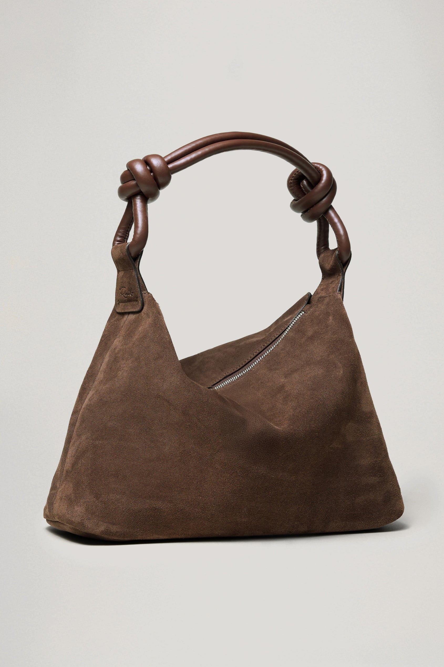 Siena Slouchy Hobo Bag in Suede With Knotted Top Strap, Zipper Closure With Fringe Tassel And Interior Snap Button Slip Pocket in Espresso Suede Colorway - Side VIew Featured