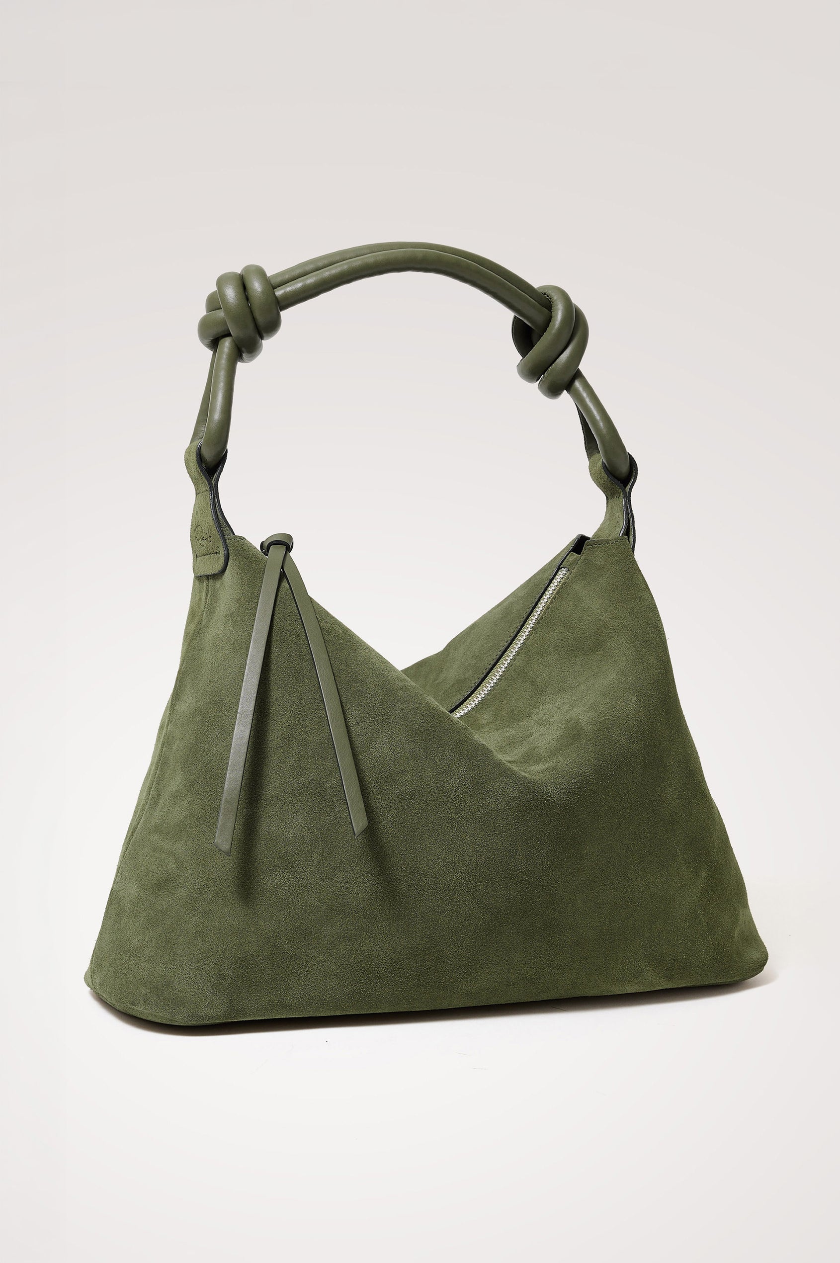 Siena Hobo Bag in Suede With Knotted Top Strap, Zip Closure With Fringe Tassel Pull, Microsuede Lining, Snap-Button Slip Pocket and Foil Logo Stamp at Interior in Olive Suede Colorway -
