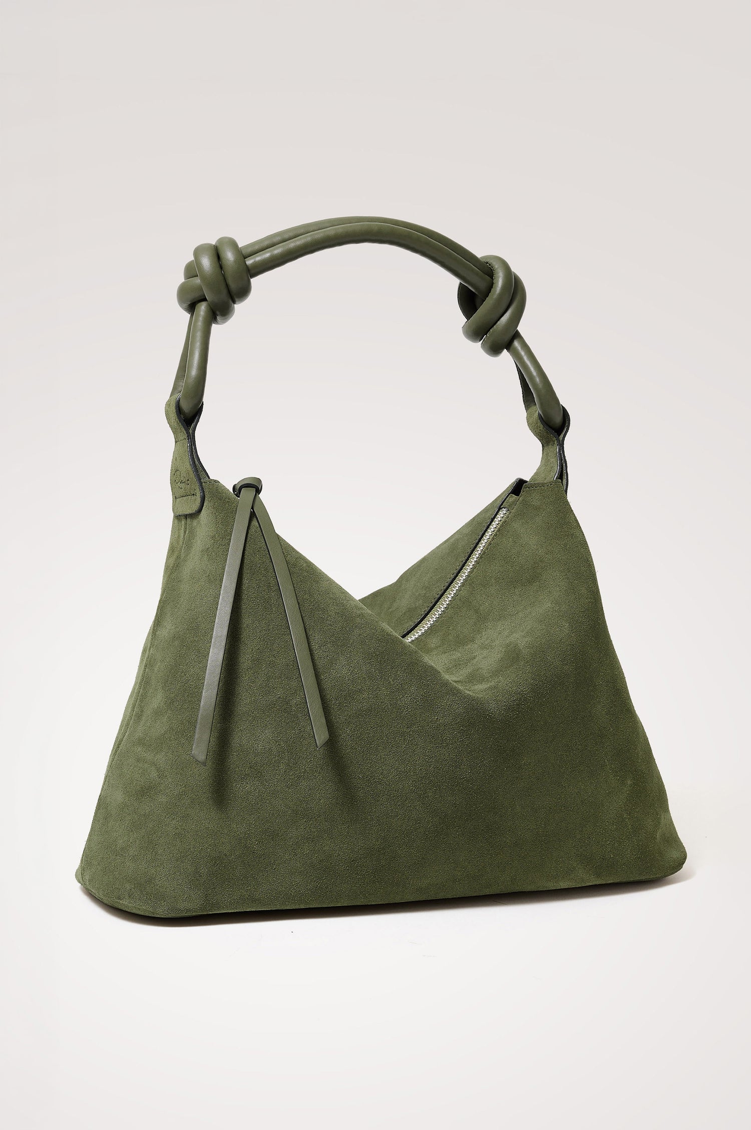 Siena Hobo Bag in Suede With Knotted Top Strap, Zip Closure With Fringe Tassel Pull, Microsuede Lining, Snap-Button Slip Pocket and Foil Logo Stamp at Interior in Olive Suede Colorway -