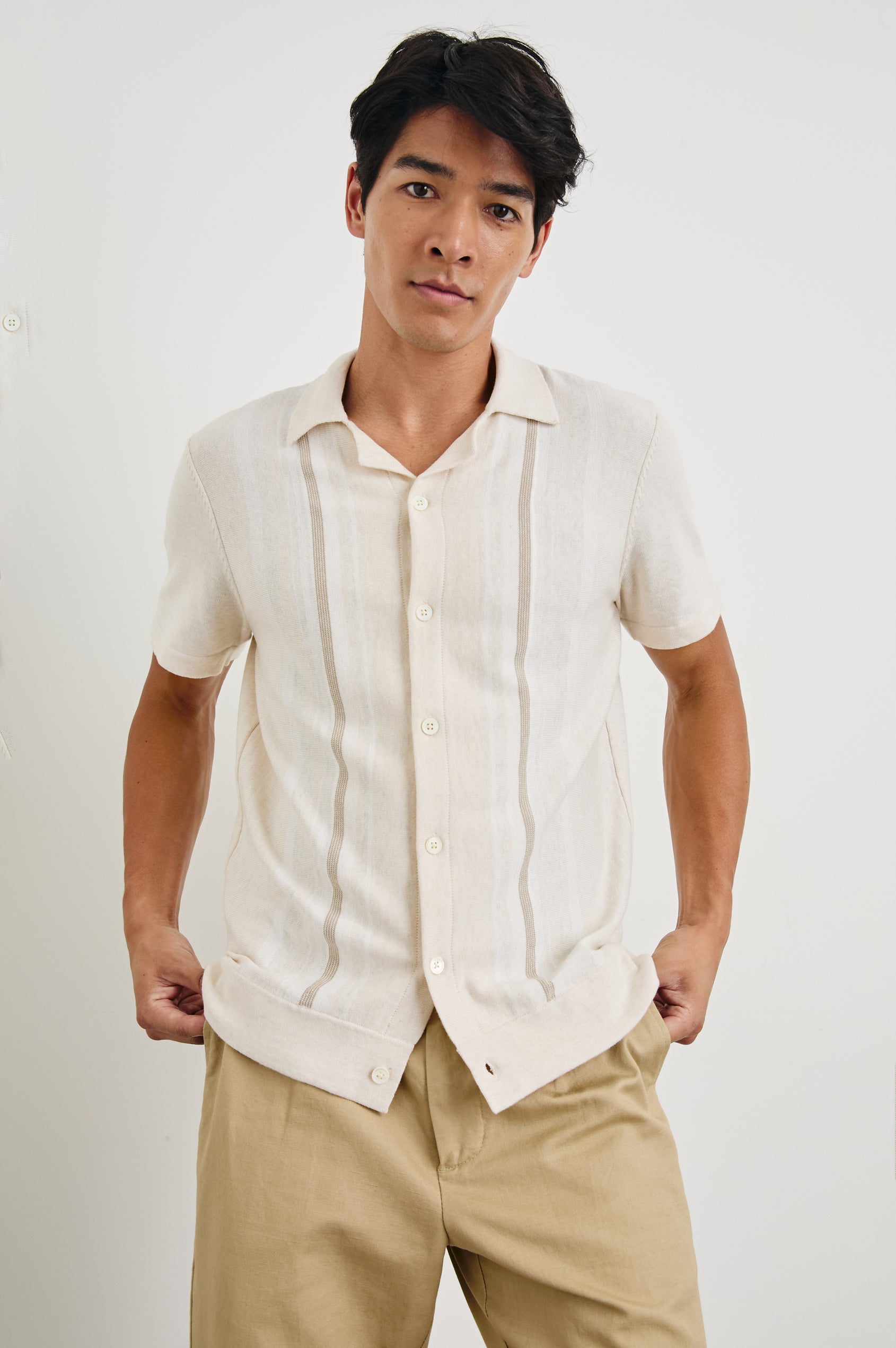 Silas Short-Sleeve Button Up in Latte Multi Colorway, with two front sections of vertical stripes in white and brown - Front View Featured on Model