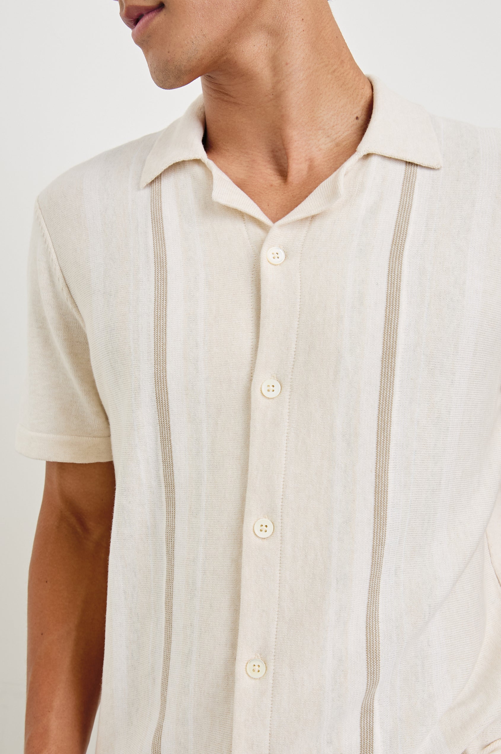 Silas Short-Sleeve Button Up in Latte Multi Colorway, with two front sections of vertical stripes in white and brown - Front View Featured on Model