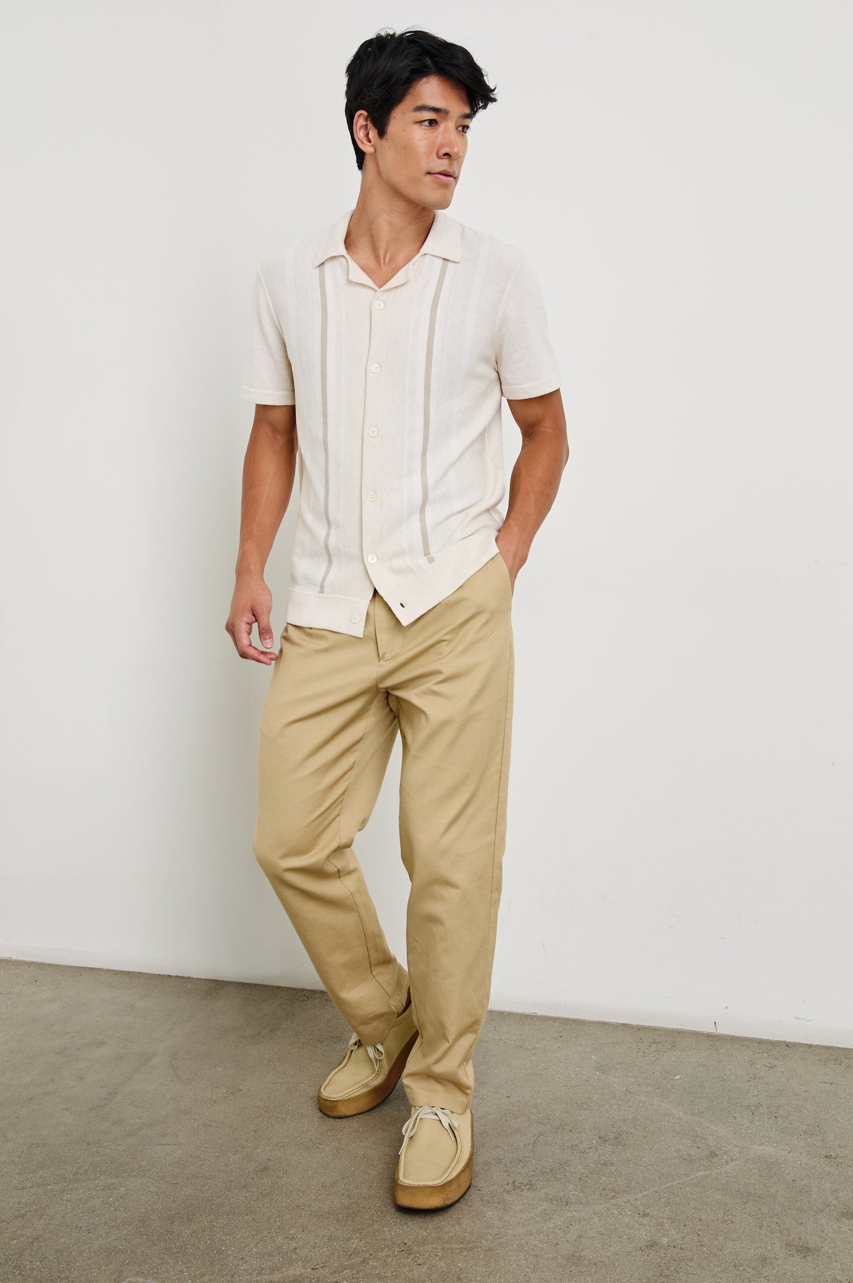 Silas Short-Sleeve Button Up in Latte Multi Colorway, with two front sections of vertical stripes in white and brown - Front Full Body View Featured on Model