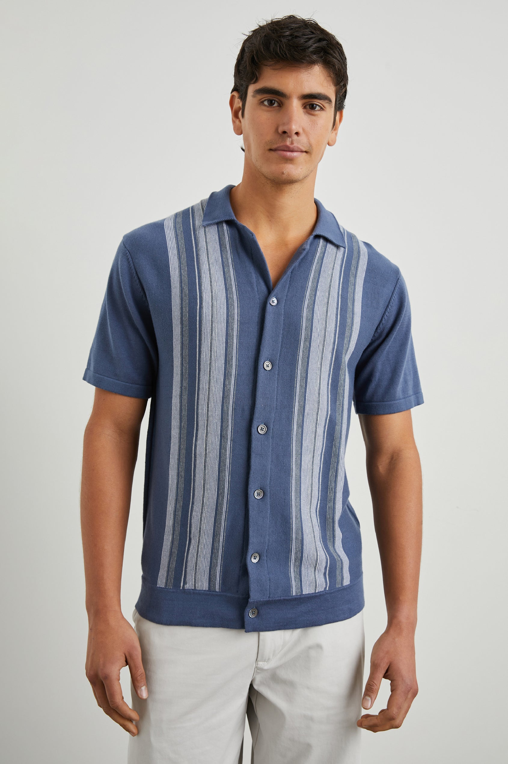 Silas Short-Sleeve Button Up in Marrakesh Blue Multi Colorway, with two front sections of vertical stripes in white and grey - Front View Featured on Model