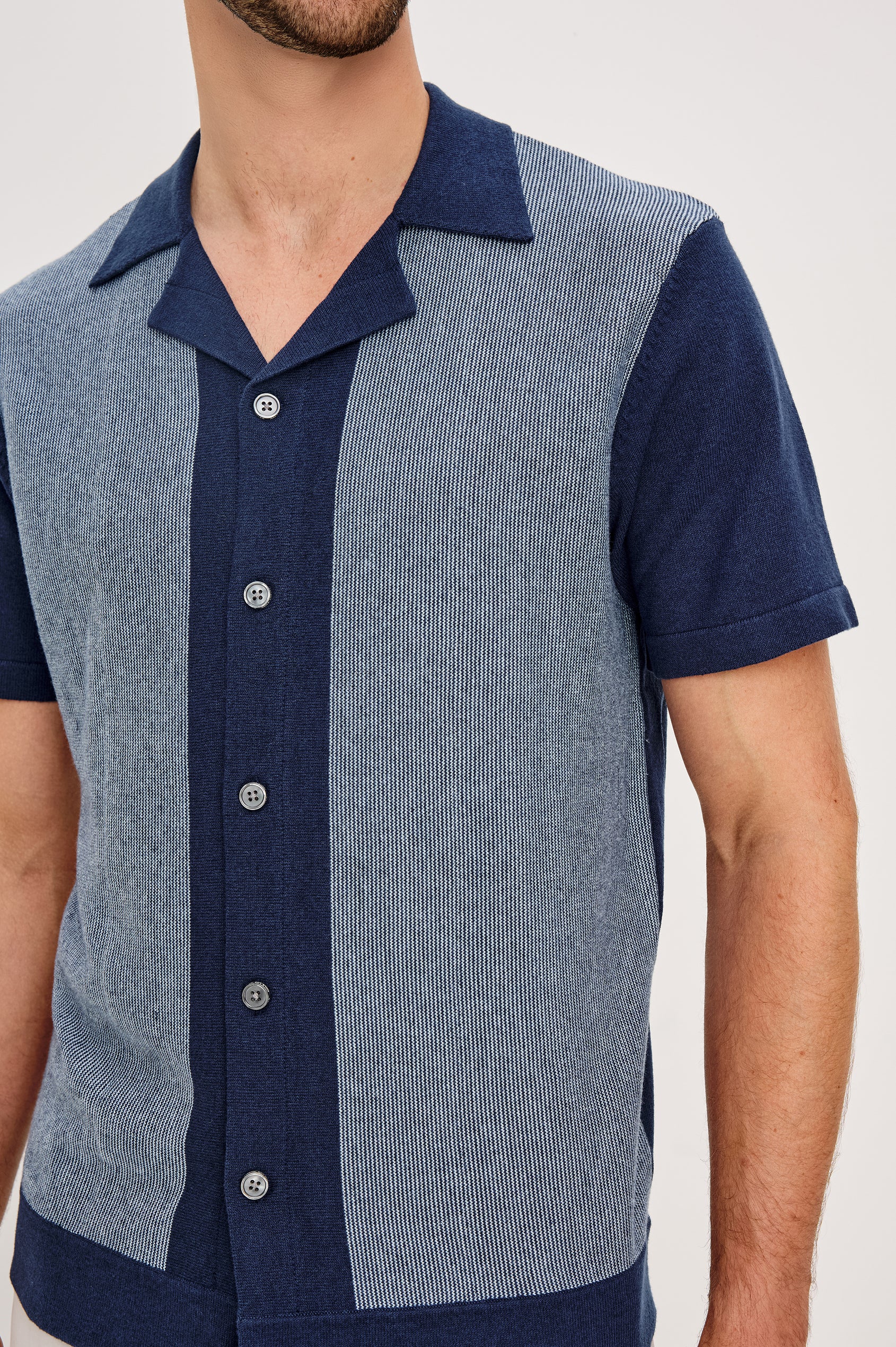 Silas short sleeve knit button down shirt with retro front striped design features in Navy Lagoon Stripe - front detail view on model 