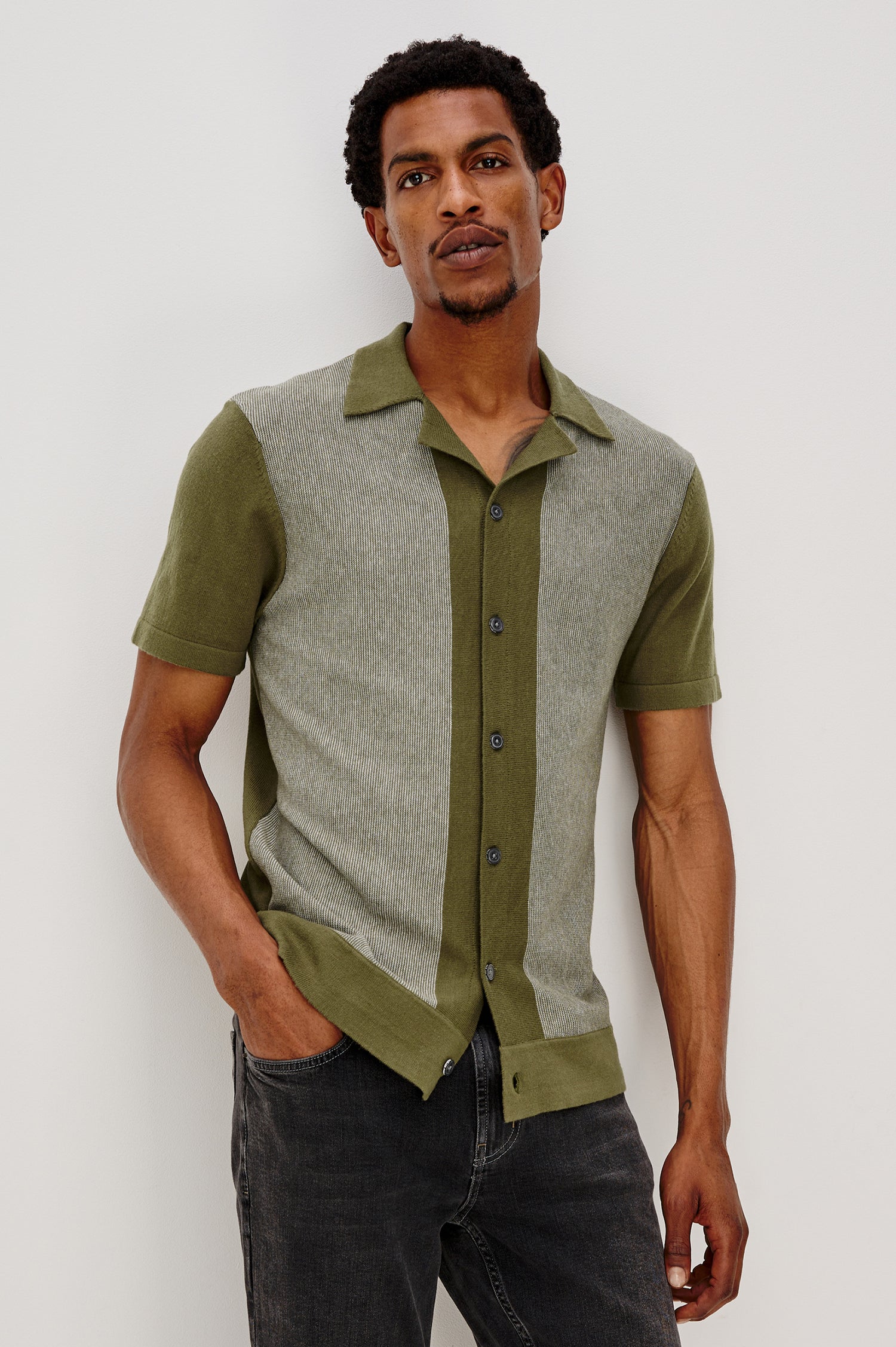 Silas short sleeve knit button down shirt with retro front striped design features in Olive Khaki Stripe - front view on model