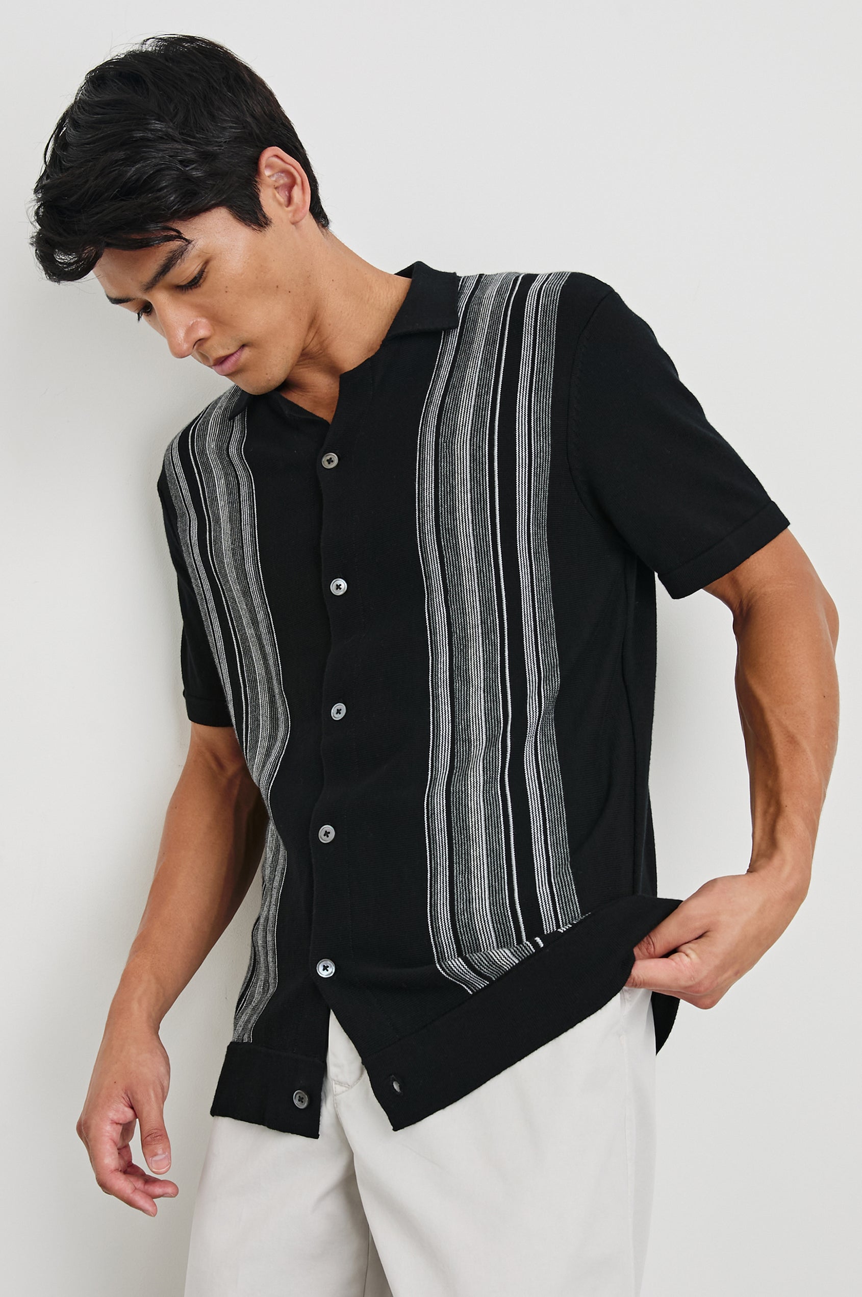 Silas Short-Sleeve Button Up in Raven Multi Colorway, with two front sections of vertical stripes in white and greys - Front View Featured on Model