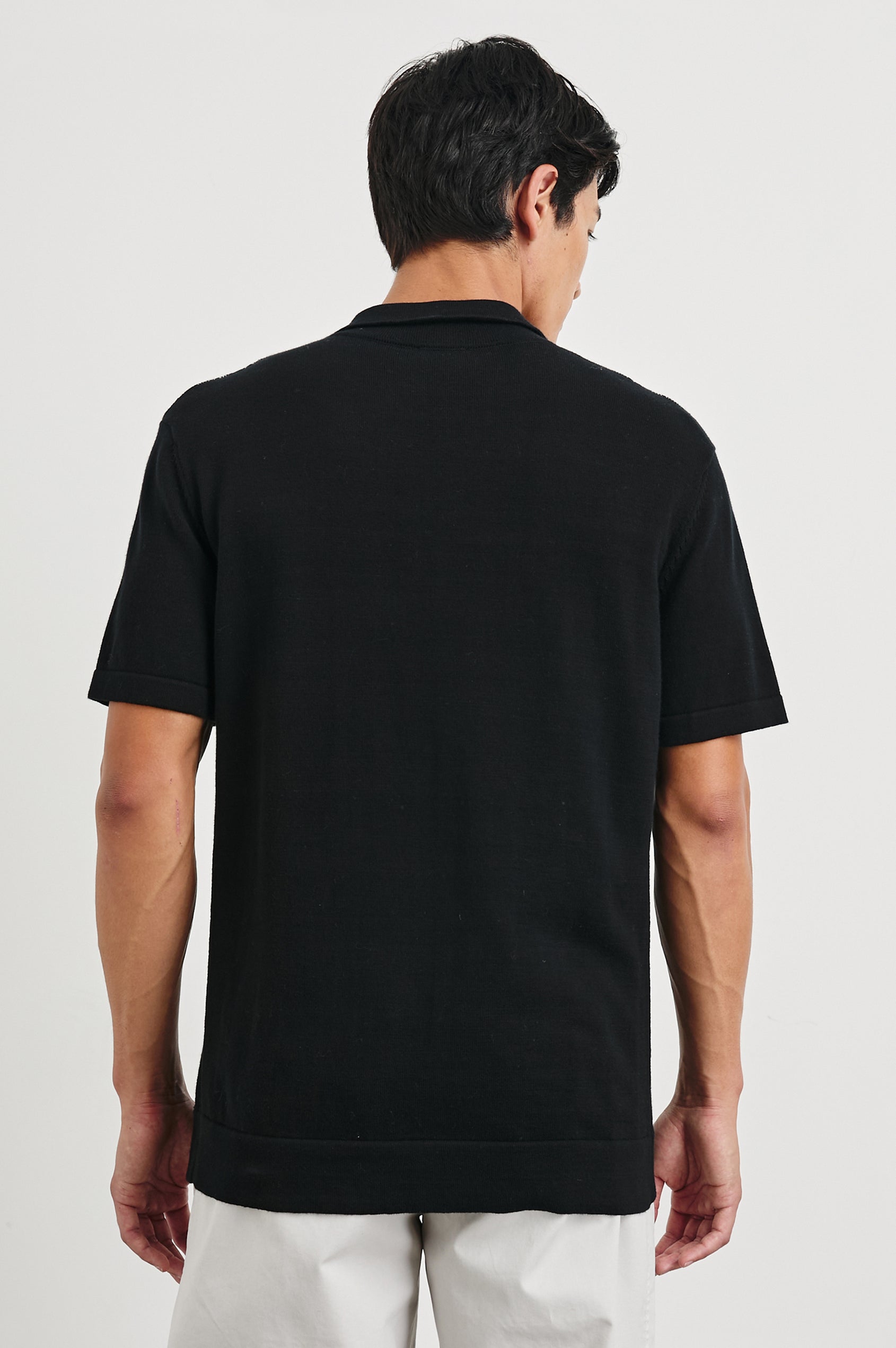 Silas Short-Sleeve Button Up in Raven Multi Colorway, with two front sections of vertical stripes in white and greys - Back View Featured on Model