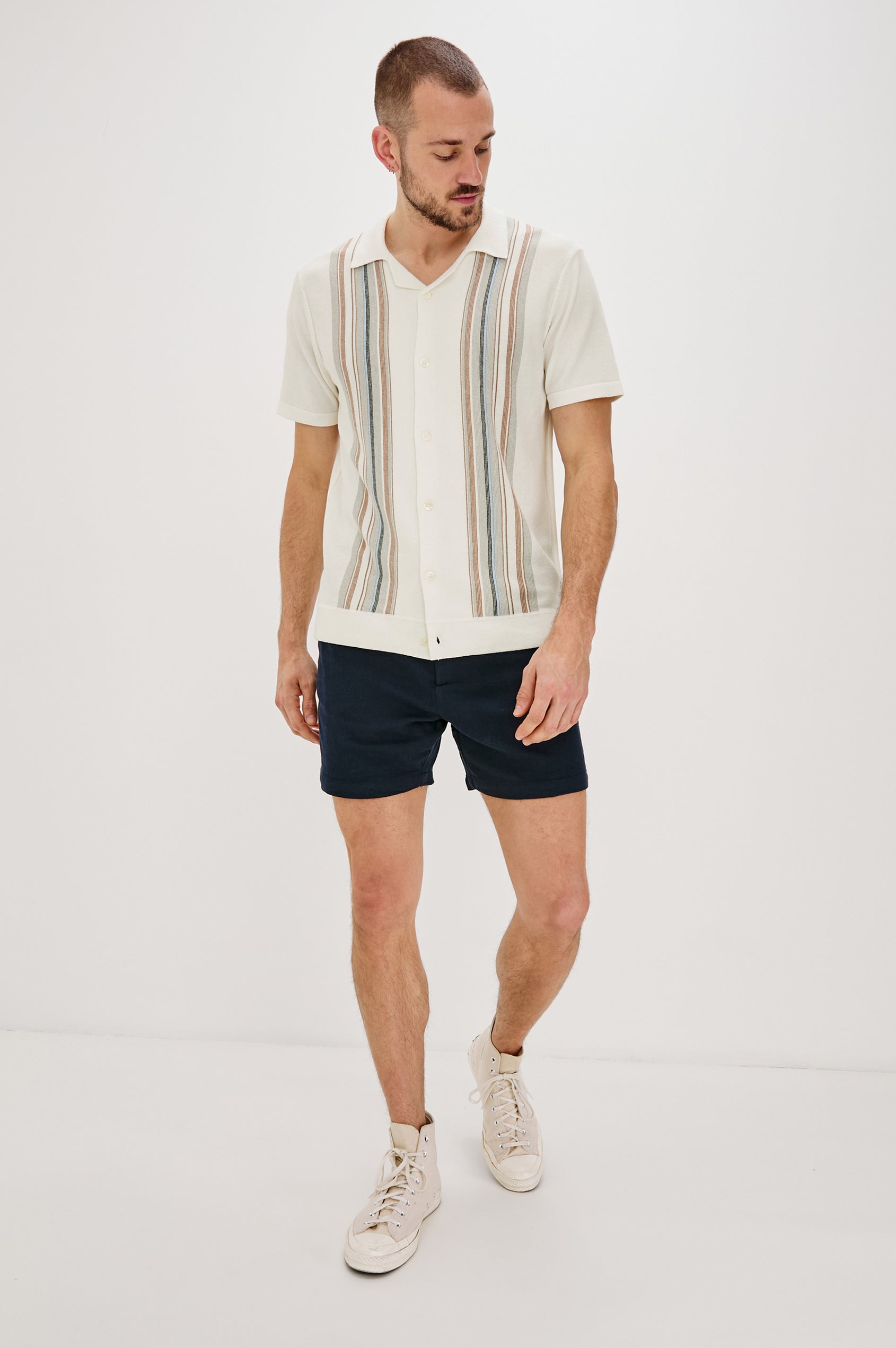 Silas Short-Sleeve Button Up in White Multi Colorway, with two front sections of vertical stripes in Blues, brown and grey - Full Body Front View Featured on Model