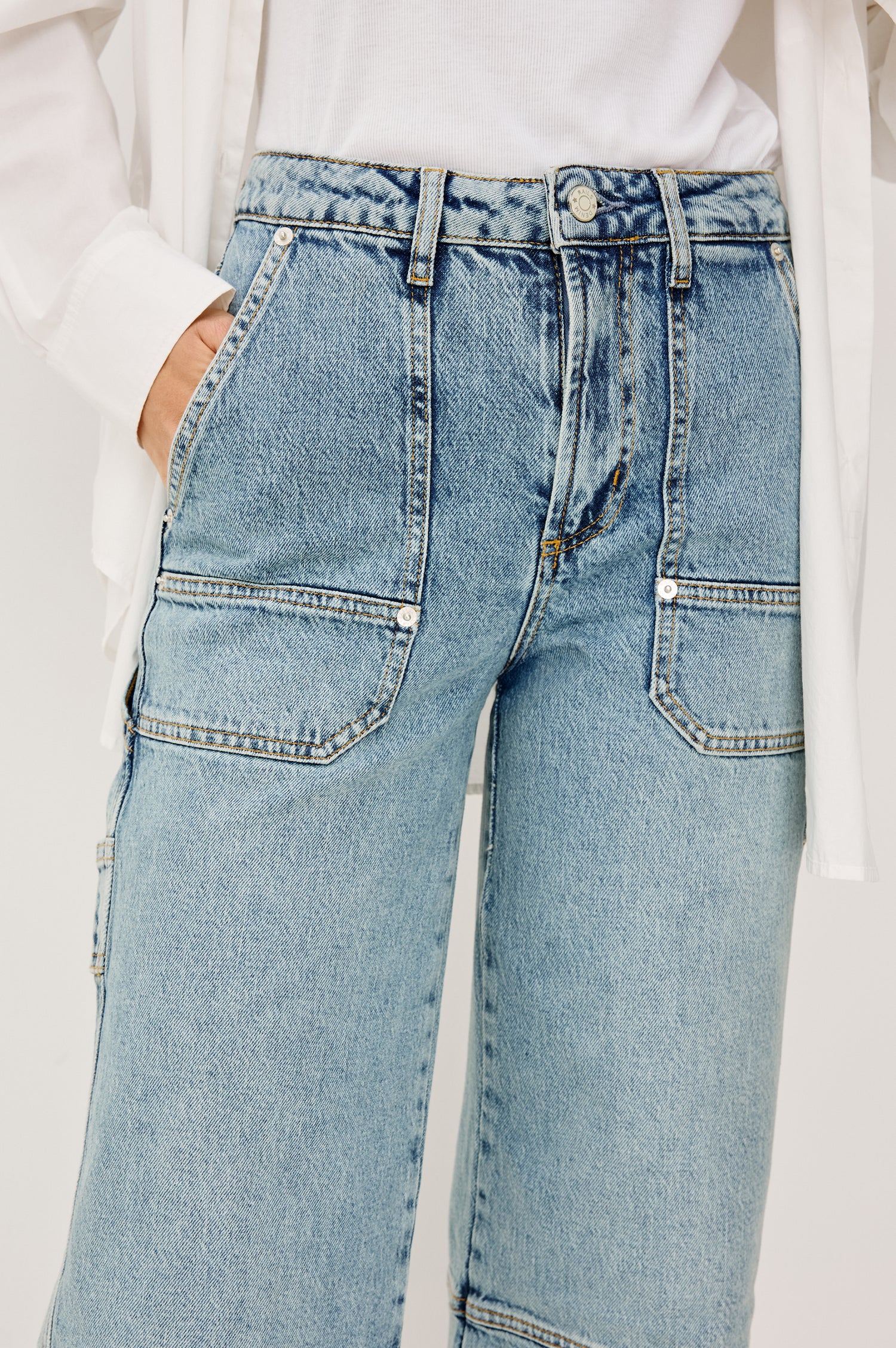 Silverado Pant in Comfort Stretch Denim With High-Waisted Fit, Wide Legs,and Utility Details and Pockets in Blueprint Colorway - Lower Body Front Close Up View Featured on Model