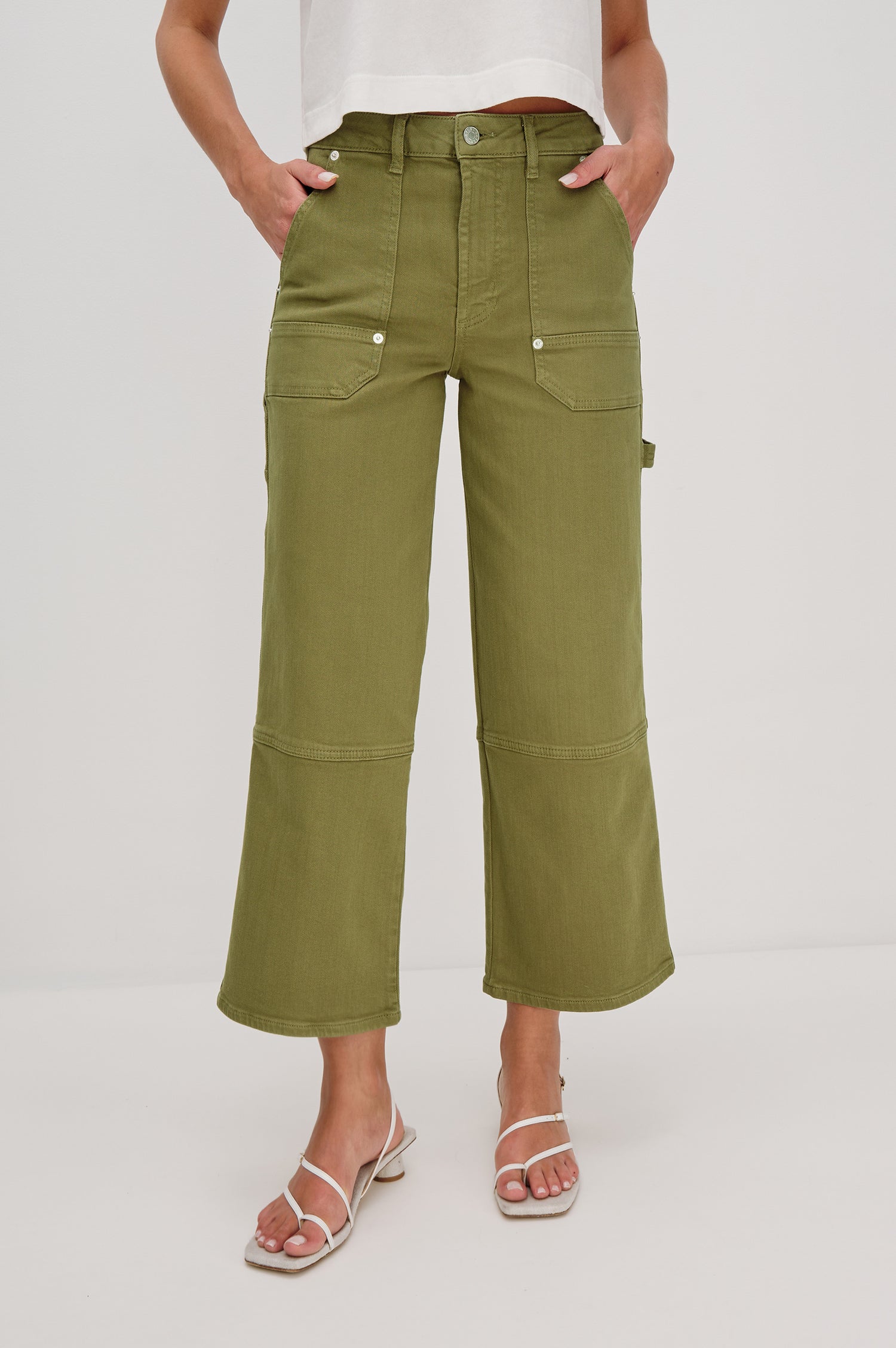 Silverado high rise wide leg crop pant with carpenter style details and contrast stitching in Dark Olive - front view on model