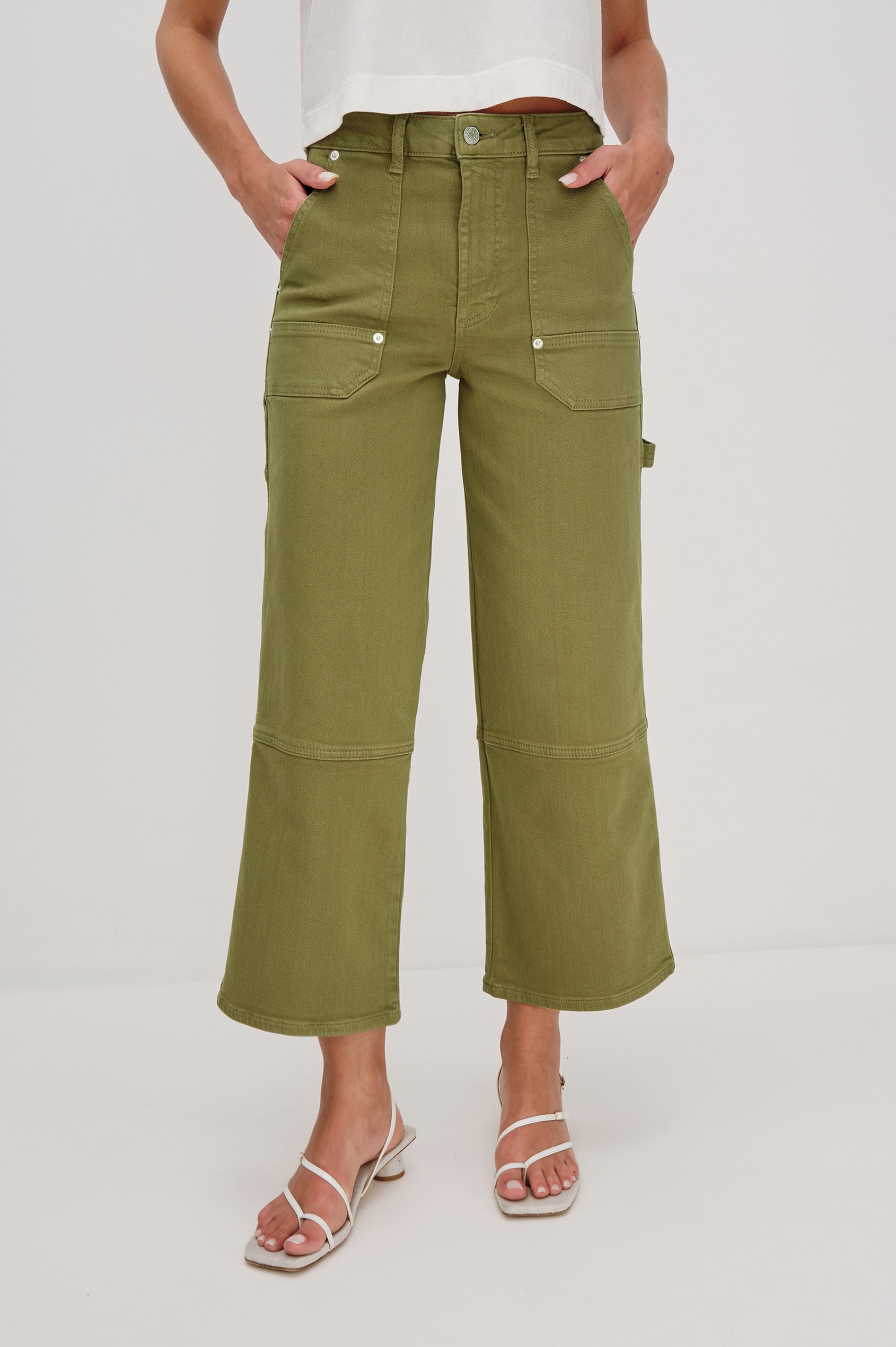 Silverado high rise wide leg crop pant with carpenter style details and contrast stitching in Dark Olive - front view on model