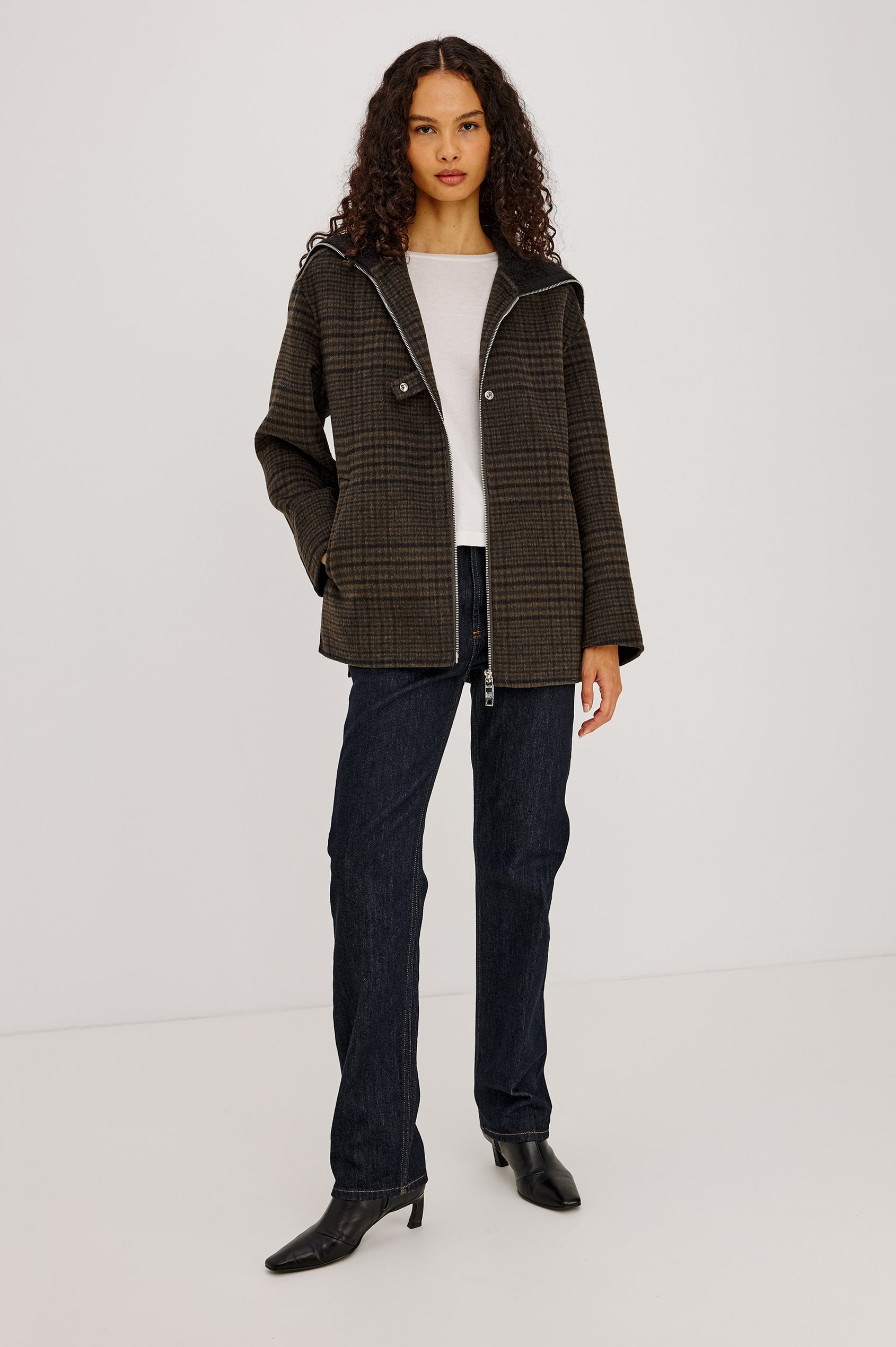 Silves Jacket in Heavy Wool Blend With Contrast Brushed Shawl Collar, Two-Way Front Zip, Single Snap Button, Long Sleeves, and Side Pockets in Highland Plaid Colorway - Full Body Front View Featured on Model