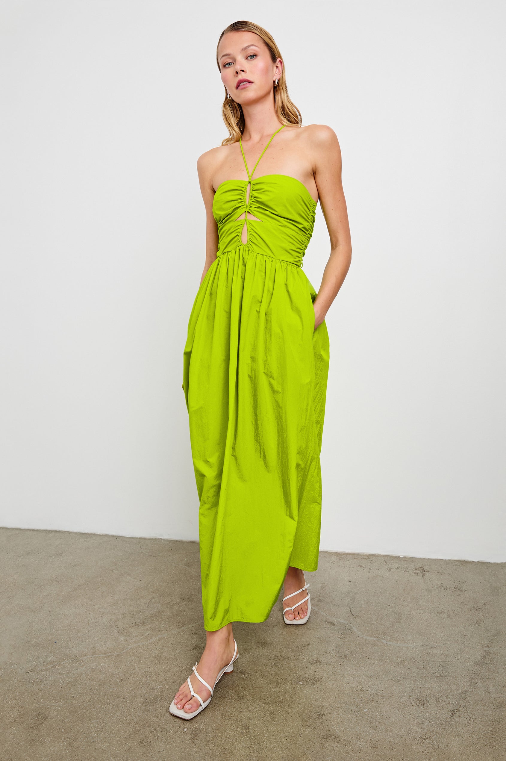 Silvia Sleeveless Maxi Dress with Spaghetti Straps with a Lower Back Tie, an Open Back, and Cutouts Along the Center of the Bodice in Banana Leaf Colorway - Front Full Body View Featured on Model