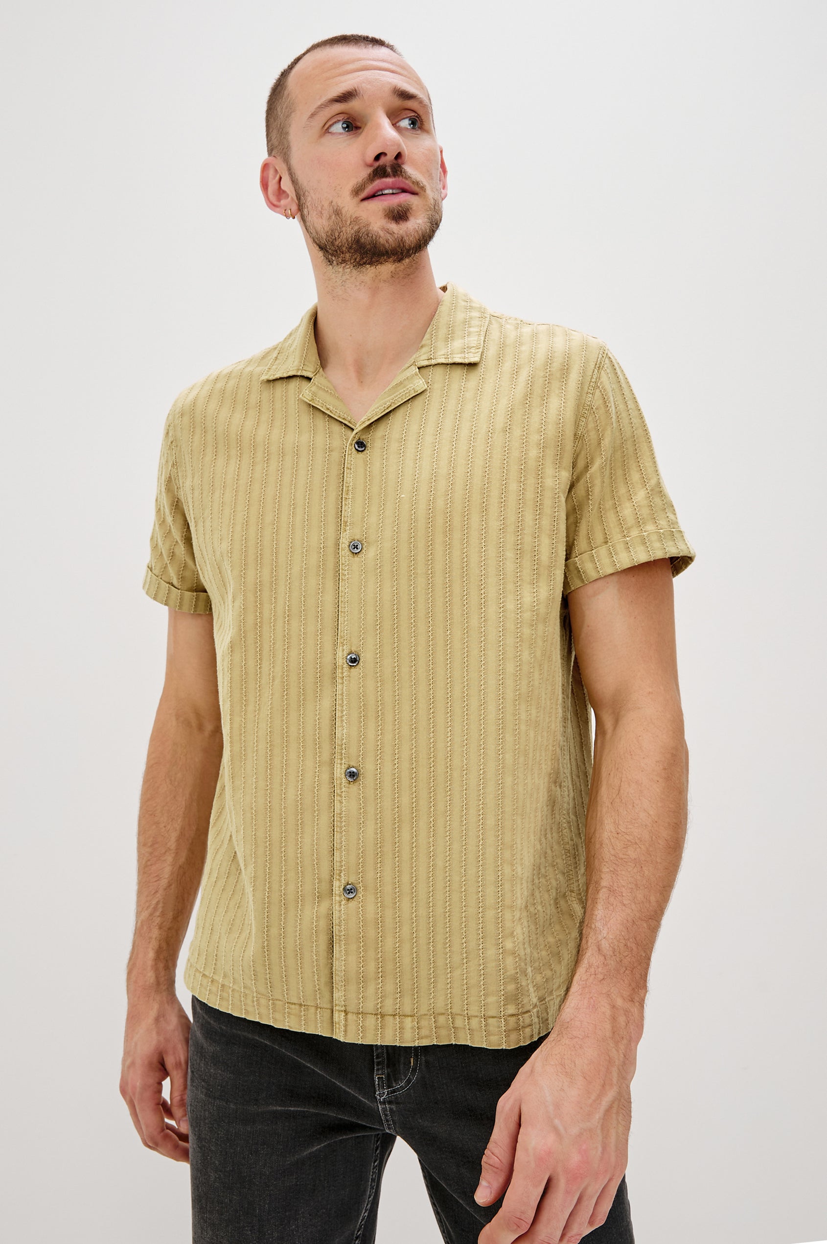 Sinclair Short Sleeve Button Up with Textured Vertical Stripes and a Camp Collar in Jute Colorway - Front View Featured on Model