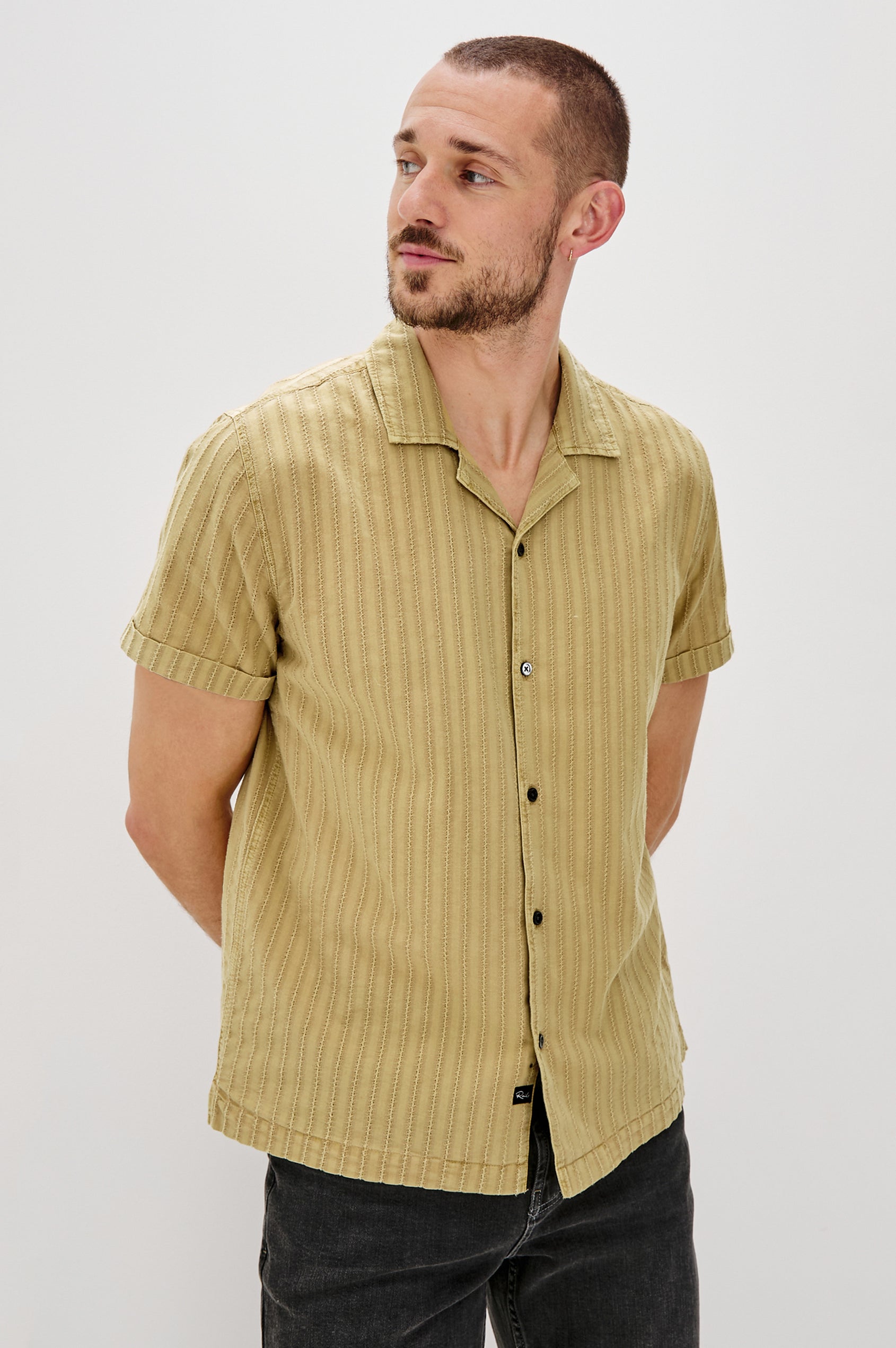 Sinclair Short Sleeve Button Up with Textured Vertical Stripes and a Camp Collar in Jute Colorway - Front View Featured on Model